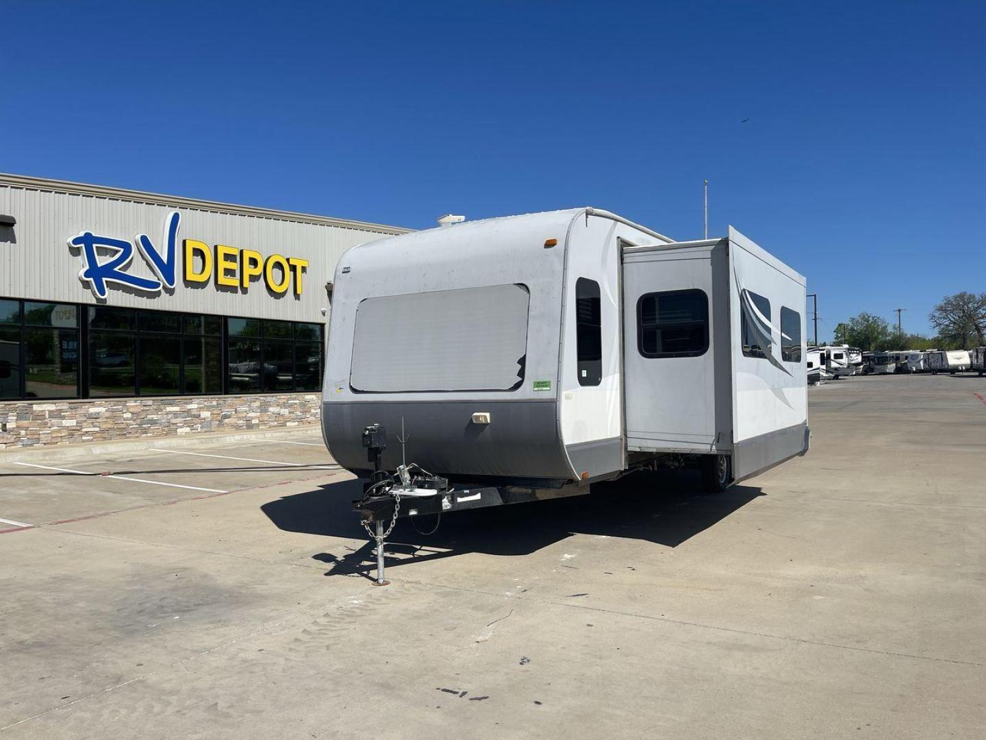 2013 GRAY HEARTLAND OPEN RANGE 288FLR - (5XMTL3726D2) , Length: 33.5 ft | Dry Weight: 7,480 lbs. | Gross Weight: 9,800 lbs. | Slides: 3 transmission, located at 4319 N Main Street, Cleburne, TX, 76033, (817) 221-0660, 32.435829, -97.384178 - The 2013 Heartland Open Range 288FLR focuses on spacious living and thoughtful design. This travel trailer offers a luxurious home on wheels for those seeking both comfort and adventure. Step into the RV and be welcomed by the innovative front living room layout. This unique design features a spacio - Photo#0