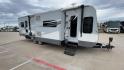 2013 GRAY HEARTLAND OPEN RANGE 288FLR - (5XMTL3726D2) , Length: 33.5 ft | Dry Weight: 7,480 lbs. | Gross Weight: 9,800 lbs. | Slides: 3 transmission, located at 4319 N Main Street, Cleburne, TX, 76033, (817) 221-0660, 32.435829, -97.384178 - The 2013 Heartland Open Range 288FLR focuses on spacious living and thoughtful design. This travel trailer offers a luxurious home on wheels for those seeking both comfort and adventure. Step into the RV and be welcomed by the innovative front living room layout. This unique design features a spacio - Photo#3