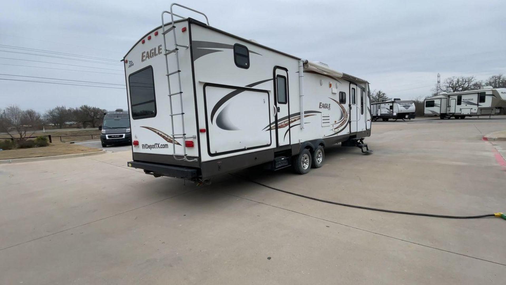 2013 TAN JAYCO EAGLE (1UJBJ0BS6D1) , located at 4319 N Main Street, Cleburne, TX, 76033, (817) 221-0660, 32.435829, -97.384178 - Photo#1