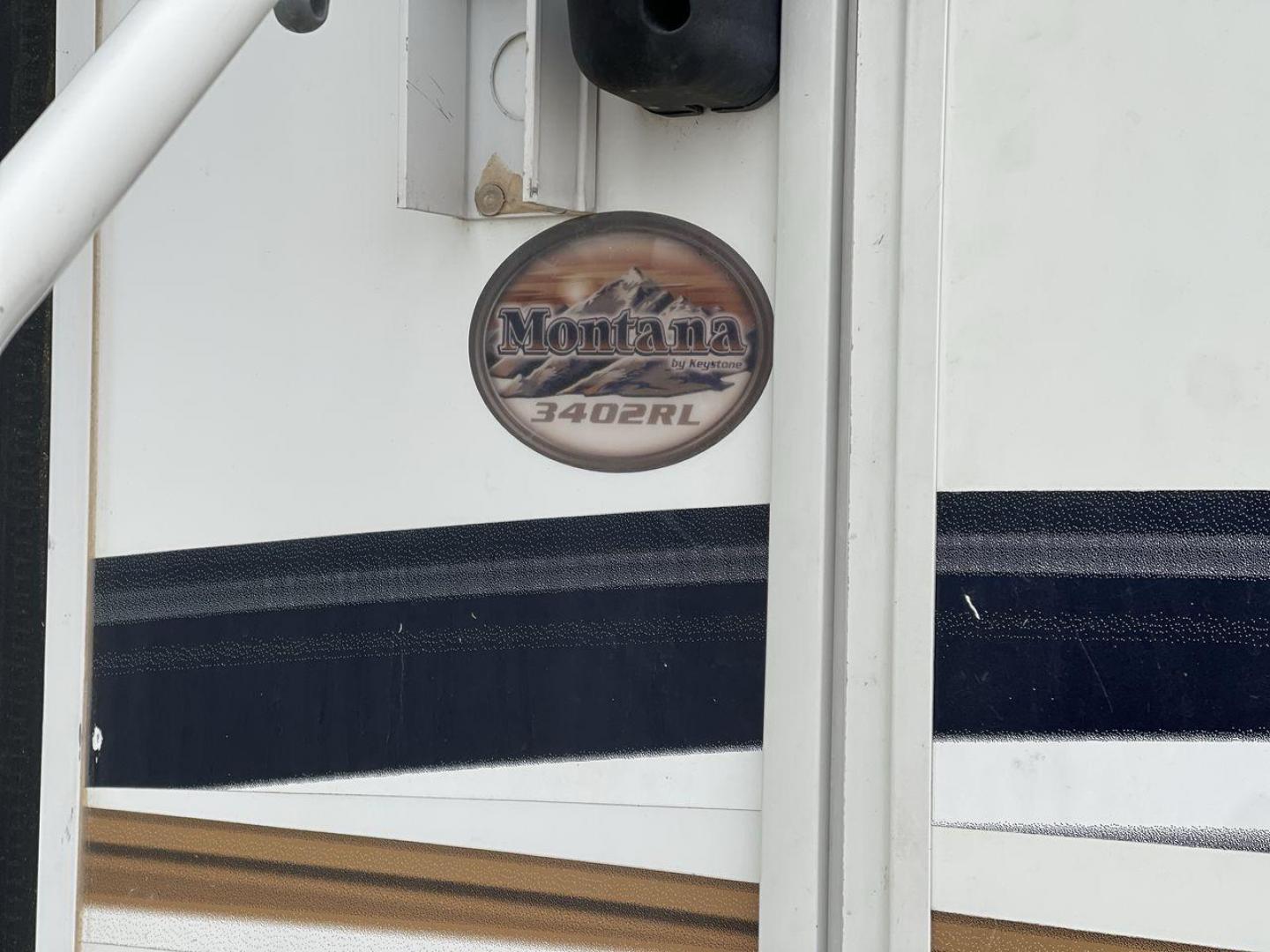 2013 TAN KEYSTONE MONTANA 3405RL - (4YDF34022D4) , Length: 37.5 ft. | Dry Weight: 12,589 lbs. | Gross Weight: 15,640 lbs. | Slides: 4 transmission, located at 4319 N Main Street, Cleburne, TX, 76033, (817) 221-0660, 32.435829, -97.384178 - Photo#22