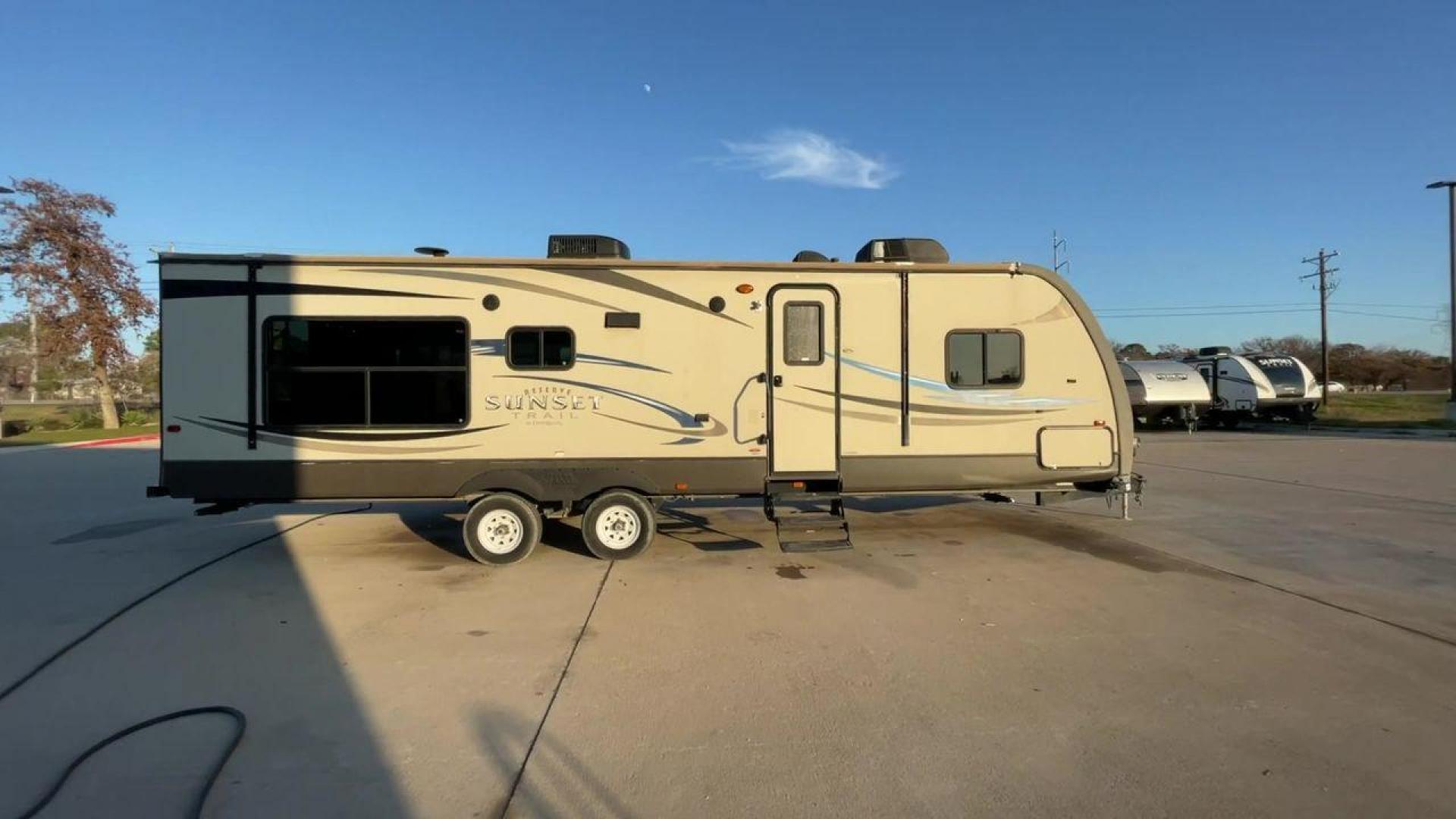 2013 TAN SUNSET TRAIL 30RE - (4V0TC3029DB) , Length: 34.42 ft.| Dry Weight: 6,288 lbs. | Gross Weight: 9,500 lbs. | Slides: 1 transmission, located at 4319 N Main Street, Cleburne, TX, 76033, (817) 221-0660, 32.435829, -97.384178 - The 2013 Sunset Trail 30RE CT offers the ideal balance of comfort and flair. This travel trailer is 34.42 feet long, so there's plenty of room for you and your loved ones to relax. With a dry weight of 6,288 pounds and a gross weight of 9,500 pounds, it provides an excellent balance of durability an - Photo#2