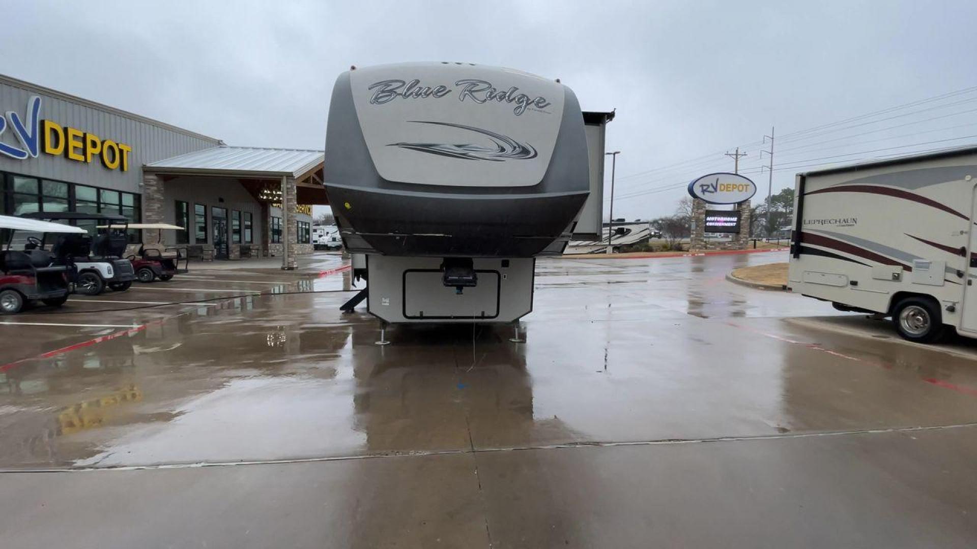 2014 TAN BLUE RIDGE 3025RL (4X4FBLF29EG) , Length: 35.5 ft. | Dry Weight: 11,614 lbs. | Gross Weight: 14,090 lbs. | Slides: 3 transmission, located at 4319 N Main Street, Cleburne, TX, 76033, (817) 221-0660, 32.435829, -97.384178 - This 2014 Forest River Fifth Wheel measures 35.5 feet long and just over 8 feet wide with a dry weight of 11,614 lbs. It has a GVWR of 14,090 lbs and a hitch weight of 2,090 lbs. This unit has automatic heating and cooling rated at 35,000 and 15,000 BTUs, respectively. The exterior of this unit is a - Photo#4