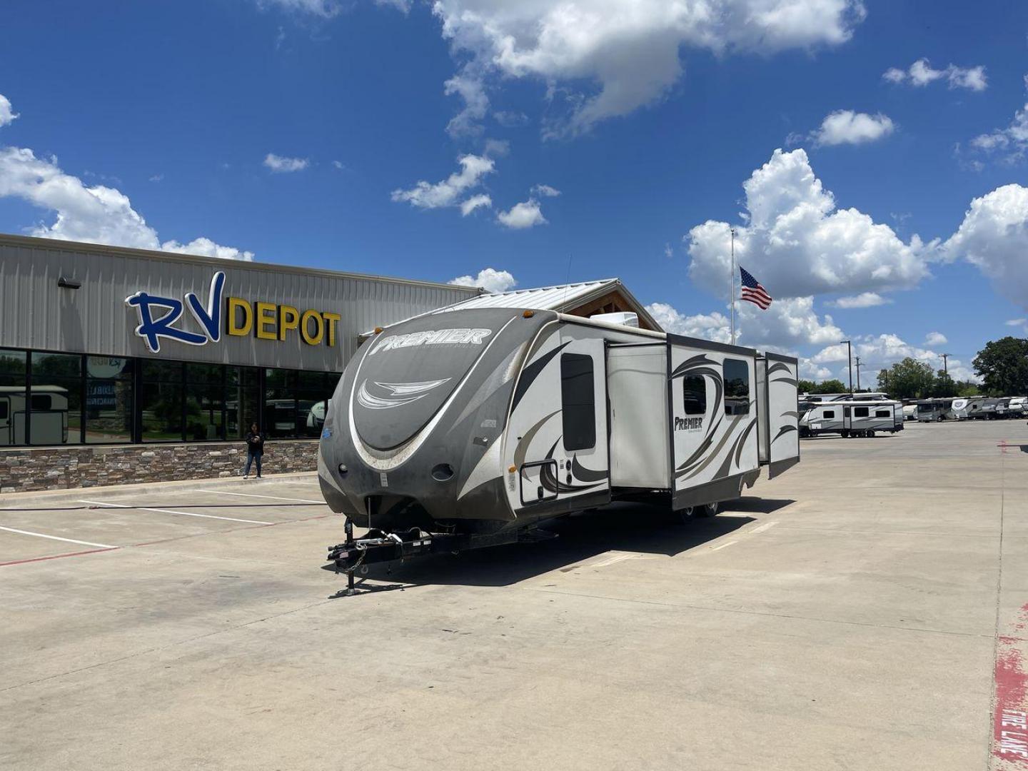 2014 TAN BULLET PREMIER 31BHPR - (4YDT31B25ED) , Length: 35.33 ft. | Dry Weight: 6,457 lbs. | Gross Weight: 8,000 lbs. | Slides: 2 transmission, located at 4319 N Main Street, Cleburne, TX, 76033, (817) 221-0660, 32.435829, -97.384178 - In search of a nice-sized, lightweight travel trailer that can still accommodate many campers? Check out this 2014 Bullet 31BHPR! This travel trailer measures around 35 ft. and weighs 6,457 lbs. unloaded. It is simple and manageable to tow with a hitch weight of 795 lbs. It also includes two power s - Photo#0