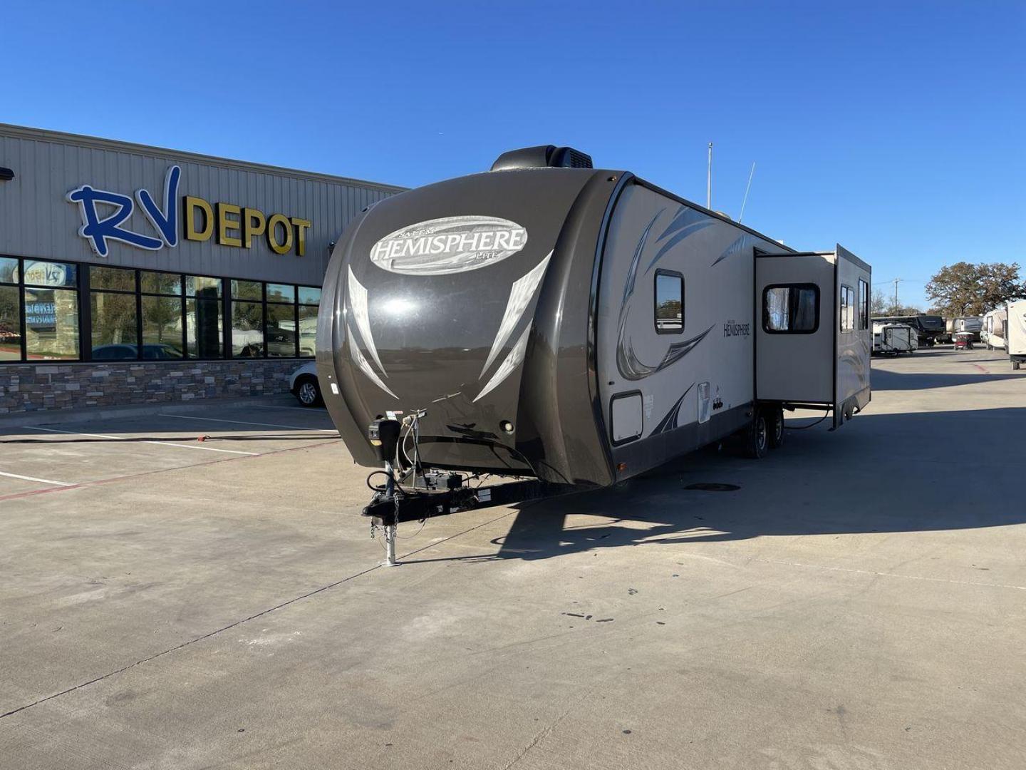 2014 TAN FOREST RIVER HEMISPHERE 282RK (4X4TSBD2XEU) , Length: 35 ft. | Dry Weight: 6,620 lbs | Gross Weight: 8,521 lbs. | Slides: 1 transmission, located at 4319 N Main Street, Cleburne, TX, 76033, (817) 221-0660, 32.435829, -97.384178 - The 2014 Forest River Hemisphere 282RK is a great travel trailer that is made to make your outdoor activities more comfortable and easy. This 35-foot trailer has a dry weight of 6,620 pounds and a gross weight of 8,521 pounds, making it easy to tow and providing plenty of space for all your gear. Th - Photo#0