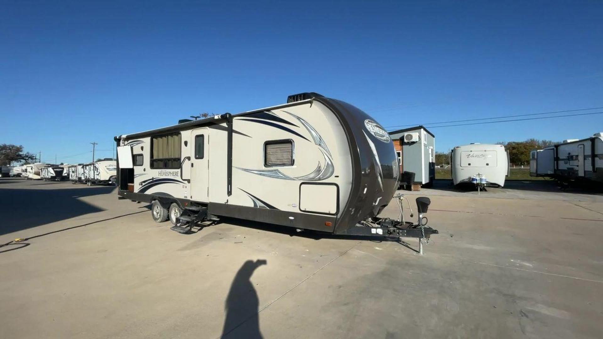 2014 TAN FOREST RIVER HEMISPHERE 282RK (4X4TSBD2XEU) , Length: 35 ft. | Dry Weight: 6,620 lbs | Gross Weight: 8,521 lbs. | Slides: 1 transmission, located at 4319 N Main Street, Cleburne, TX, 76033, (817) 221-0660, 32.435829, -97.384178 - The 2014 Forest River Hemisphere 282RK is a great travel trailer that is made to make your outdoor activities more comfortable and easy. This 35-foot trailer has a dry weight of 6,620 pounds and a gross weight of 8,521 pounds, making it easy to tow and providing plenty of space for all your gear. Th - Photo#3