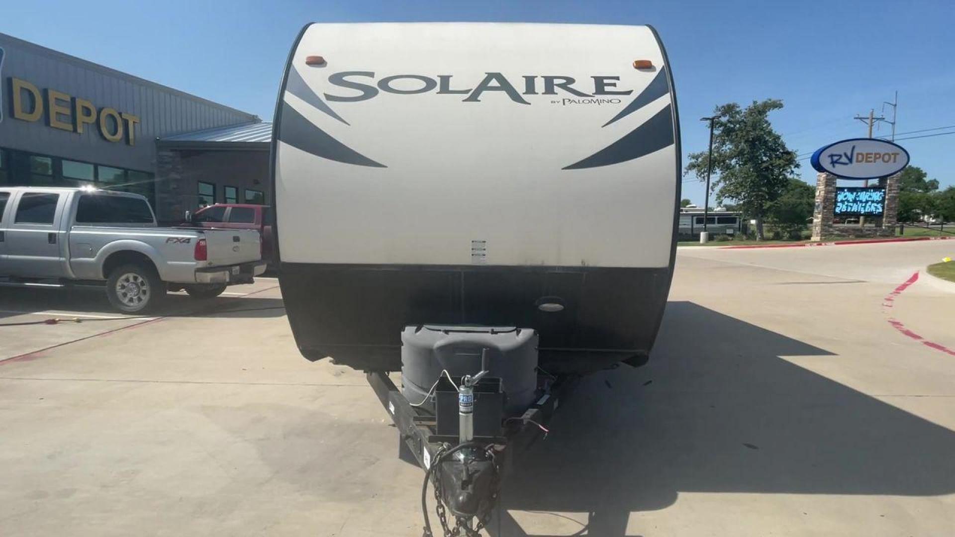 2014 TAN FOREST RIVER SOLAIRE 26RBSS (4X4TPAB28EN) , Length: 29.42 ft. | Dry Weight: 4,695 lbs. | Gross Weight: 7,570 lbs. | Slides: 1 transmission, located at 4319 N Main Street, Cleburne, TX, 76033, (817) 221-0660, 32.435829, -97.384178 - Discover extra features that contribute to making this RV an ideal investment. (1) The Solaire 26RBSS offers the advantages of being easier to tow and maneuver (2) The main living area features a U-shaped dinette and a slide-out with a sofa or dinette option (3) It also has power retractable aw - Photo#4