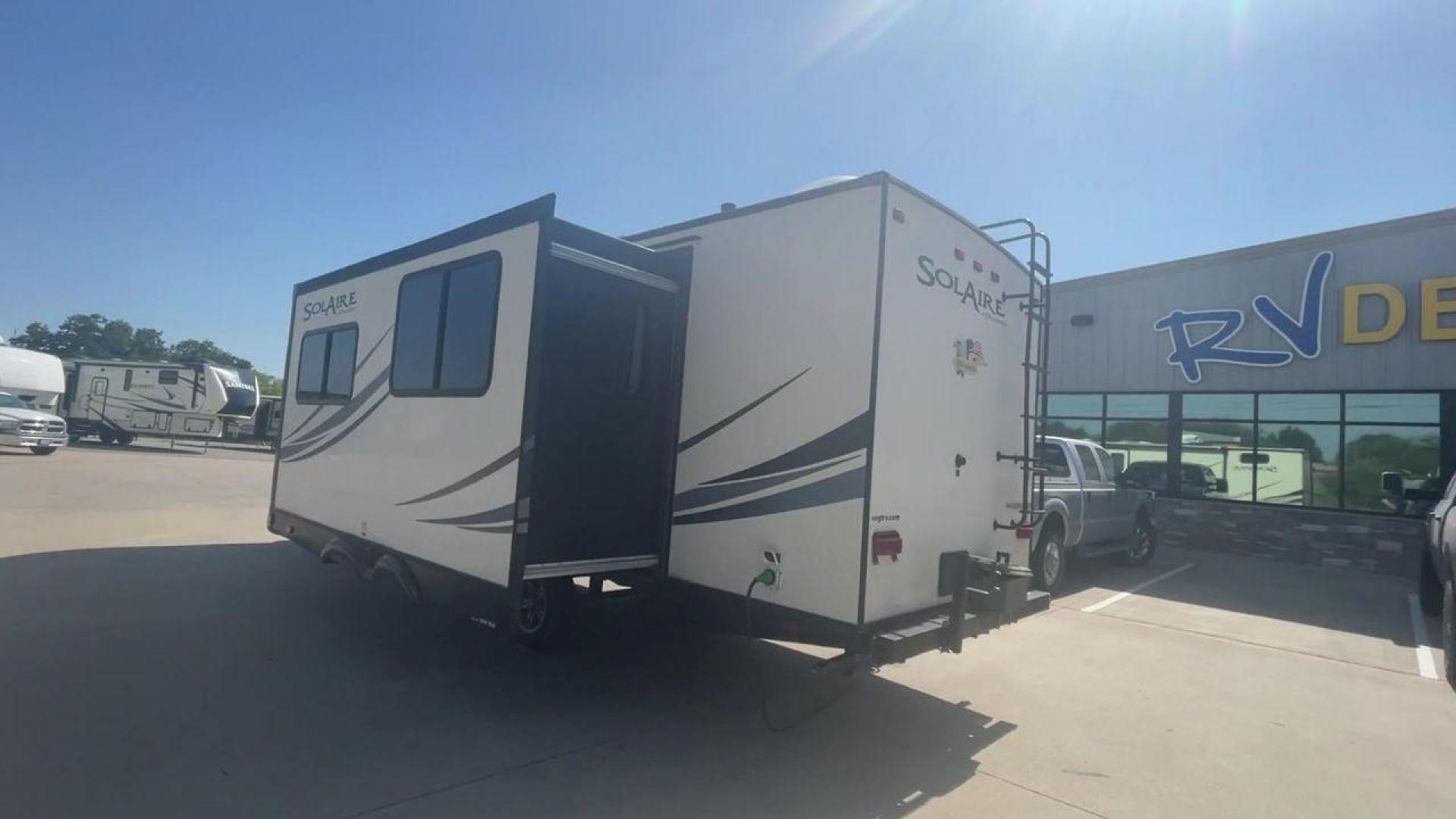 2014 TAN FOREST RIVER SOLAIRE 26RBSS (4X4TPAB28EN) , Length: 29.42 ft. | Dry Weight: 4,695 lbs. | Gross Weight: 7,570 lbs. | Slides: 1 transmission, located at 4319 N Main Street, Cleburne, TX, 76033, (817) 221-0660, 32.435829, -97.384178 - Discover extra features that contribute to making this RV an ideal investment. (1) The Solaire 26RBSS offers the advantages of being easier to tow and maneuver (2) The main living area features a U-shaped dinette and a slide-out with a sofa or dinette option (3) It also has power retractable aw - Photo#7