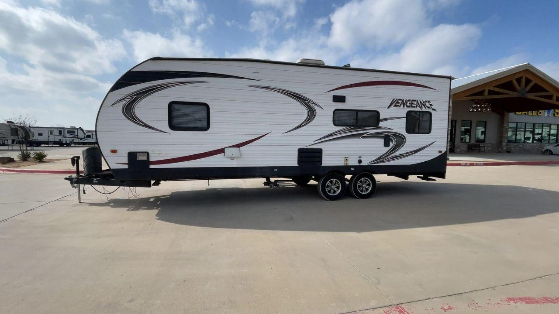 2014 WHITE FOREST RIVER VENGEANCE 25V - (4X4TVGA25EX) , Length: 30.5 ft. | Dry Weight: 6,366 lbs. | Gross Weight: 9,985 lbs. | Slides: 0 transmission, located at 4319 N Main Street, Cleburne, TX, 76033, (817) 221-0660, 32.435829, -97.384178 - The 2014 Forest River Vengeance 25V is a tough and roomy travel trailer made for people who love the outdoors and want to be comfortable and easy on their trips. This trailer provides generous living space and is conveniently lightweight, making it a breeze to tow. With its compact size, the Vengean - Photo#6