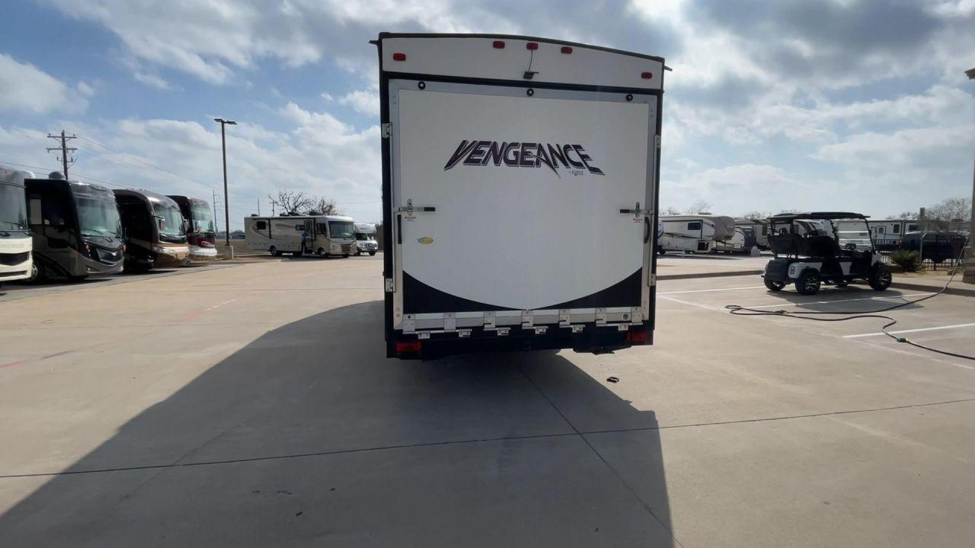 2014 WHITE FOREST RIVER VENGEANCE 25V - (4X4TVGA25EX) , Length: 30.5 ft. | Dry Weight: 6,366 lbs. | Gross Weight: 9,985 lbs. | Slides: 0 transmission, located at 4319 N Main Street, Cleburne, TX, 76033, (817) 221-0660, 32.435829, -97.384178 - The 2014 Forest River Vengeance 25V is a tough and roomy travel trailer made for people who love the outdoors and want to be comfortable and easy on their trips. This trailer provides generous living space and is conveniently lightweight, making it a breeze to tow. With its compact size, the Vengean - Photo#8