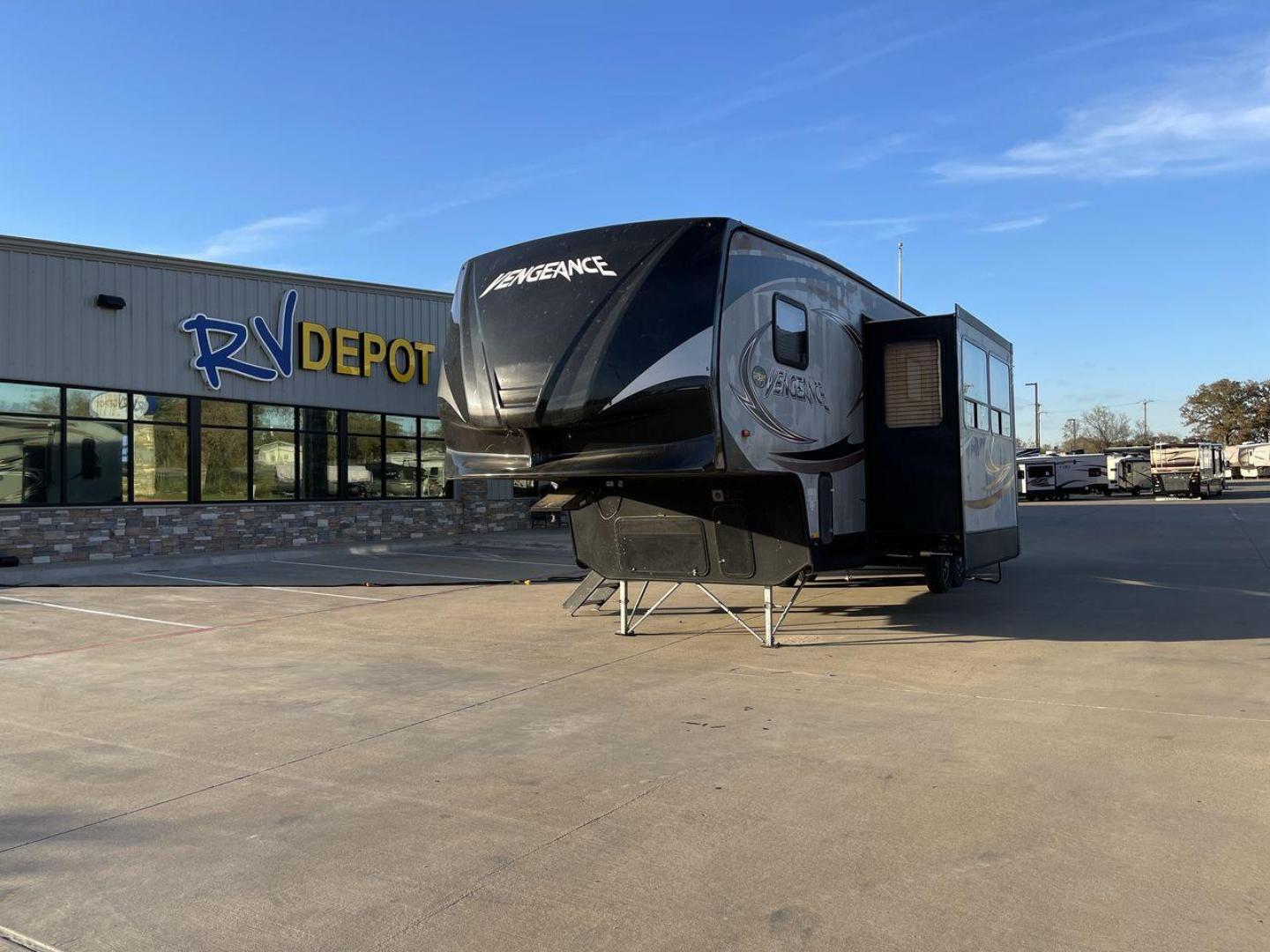 2014 WHITE FOREST RIVER VENGEANCE 312A (4X4FVGG22EY) , Length: 37.92 ft. | Dry Weight: 10,068 lbs. | Gross Weight: 14,508 lbs. | Slides: 1 transmission, located at 4319 N Main Street, Cleburne, TX, 76033, (817) 221-0660, 32.435829, -97.384178 - This 2014 Vengeance Toy Hauler has a dry weight of 10,068 lbs and a GVWR of 14,508 lbs with a hitch weight of 2,508 lbs. This unit also has automatic heating and cooling for optimal temperature control. The exterior of this toy hauler is a simple cream base with black and red accents. This model als - Photo#0