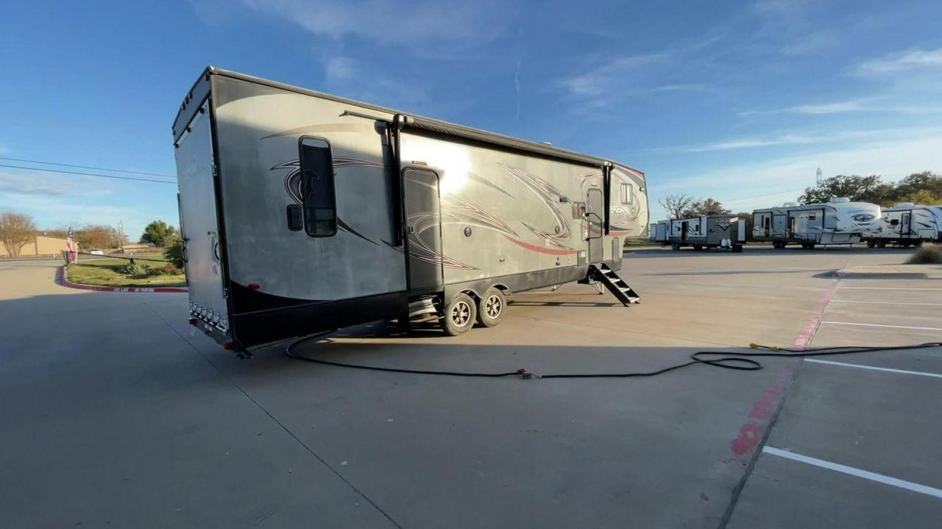 2014 WHITE FOREST RIVER VENGEANCE 312A (4X4FVGG22EY) , Length: 37.92 ft. | Dry Weight: 10,068 lbs. | Gross Weight: 14,508 lbs. | Slides: 1 transmission, located at 4319 N Main Street, Cleburne, TX, 76033, (817) 221-0660, 32.435829, -97.384178 - This 2014 Vengeance Toy Hauler has a dry weight of 10,068 lbs and a GVWR of 14,508 lbs with a hitch weight of 2,508 lbs. This unit also has automatic heating and cooling for optimal temperature control. The exterior of this toy hauler is a simple cream base with black and red accents. This model als - Photo#1