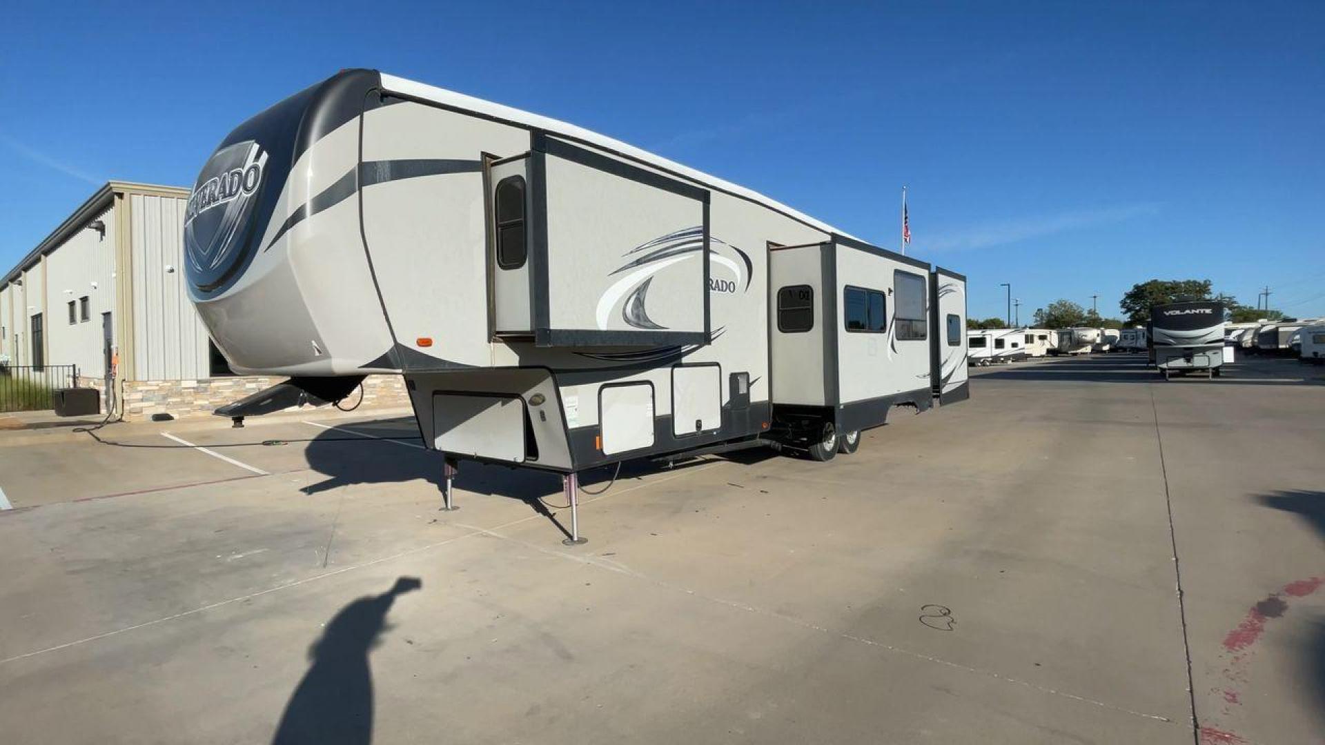 2014 HEARTLAND SILVERADO 37QB (5SFBG412XEE) , Length: 41.6 ft. | Dry Weight: 11,660 lbs. | Gross Weight: 15,000 lbs. | Slides: 4 transmission, located at 4319 N Main Street, Cleburne, TX, 76033, (817) 221-0660, 32.435829, -97.384178 - The 2014 Heartland Silverado 37QB fifth-wheel camper stands out with its spacious design and modern aesthetic. Measuring 41.6 feet in length, this unit has a dry weight of 11,660 lbs and a gross weight of 15,000 lbs, making it a substantial yet manageable choice for extended trips or full-time livin - Photo#5