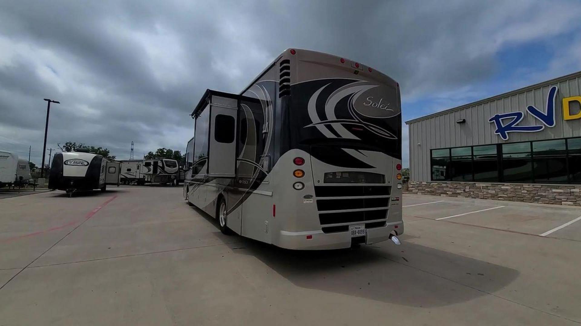 2014 ITASCA SOLEI 38R (4UZACJDT2EC) , Length: 39.8 ft. | Gross Weight: 27,910 lbs. | Slides: 2 transmission, located at 4319 N Main Street, Cleburne, TX, 76033, (817) 221-0660, 32.435829, -97.384178 - The 2014 Itasca Solei 38R Motor Home is a sophisticated and spacious Class A RV designed for the ultimate road-tripping experience. Powered by a potent 300-horsepower Cummins diesel engine and built on a Freightliner XCS chassis, this motorhome ensures a smooth and powerful ride. Measuring 39 feet i - Photo#1