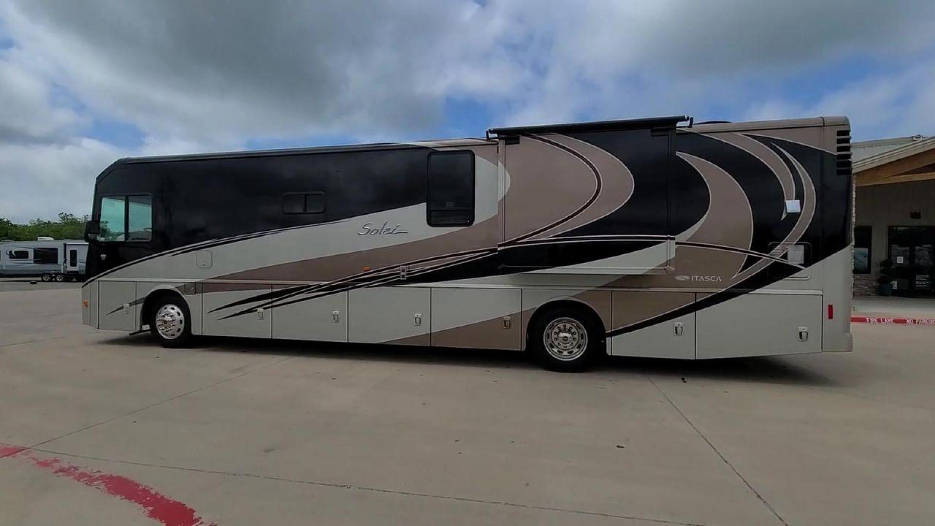 2014 ITASCA SOLEI 38R (4UZACJDT2EC) , Length: 39.8 ft. | Gross Weight: 27,910 lbs. | Slides: 2 transmission, located at 4319 N Main Street, Cleburne, TX, 76033, (817) 221-0660, 32.435829, -97.384178 - The 2014 Itasca Solei 38R Motor Home is a sophisticated and spacious Class A RV designed for the ultimate road-tripping experience. Powered by a potent 300-horsepower Cummins diesel engine and built on a Freightliner XCS chassis, this motorhome ensures a smooth and powerful ride. Measuring 39 feet i - Photo#2