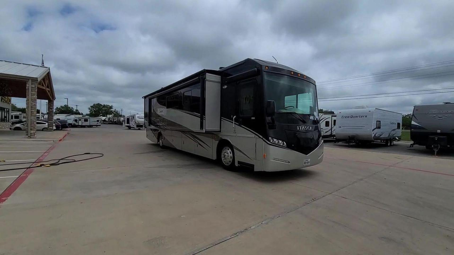 2014 ITASCA SOLEI 38R (4UZACJDT2EC) , Length: 39.8 ft. | Gross Weight: 27,910 lbs. | Slides: 2 transmission, located at 4319 N Main Street, Cleburne, TX, 76033, (817) 221-0660, 32.435829, -97.384178 - The 2014 Itasca Solei 38R Motor Home is a sophisticated and spacious Class A RV designed for the ultimate road-tripping experience. Powered by a potent 300-horsepower Cummins diesel engine and built on a Freightliner XCS chassis, this motorhome ensures a smooth and powerful ride. Measuring 39 feet i - Photo#5