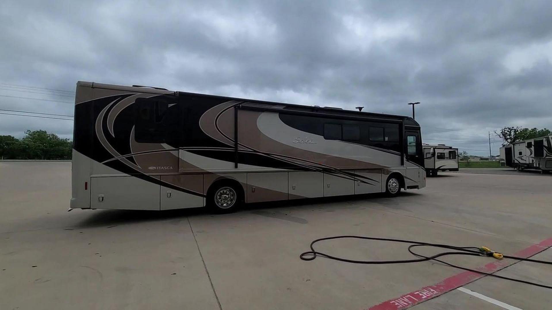 2014 ITASCA SOLEI 38R (4UZACJDT2EC) , Length: 39.8 ft. | Gross Weight: 27,910 lbs. | Slides: 2 transmission, located at 4319 N Main Street, Cleburne, TX, 76033, (817) 221-0660, 32.435829, -97.384178 - The 2014 Itasca Solei 38R Motor Home is a sophisticated and spacious Class A RV designed for the ultimate road-tripping experience. Powered by a potent 300-horsepower Cummins diesel engine and built on a Freightliner XCS chassis, this motorhome ensures a smooth and powerful ride. Measuring 39 feet i - Photo#7