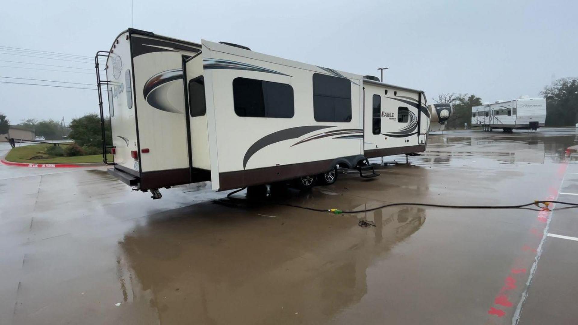 2014 BEIGE JAYCO EAGLEPREMIER 338RETS (1UJBJ0BU9E1) , Length: 39 ft. | Dry Weight: 8,590 lbs. | Gross Weight: 10,950 lbs. | Slides: 3 transmission, located at 4319 N Main Street, Cleburne, TX, 76033, (817) 221-0660, 32.435829, -97.384178 - Photo#1