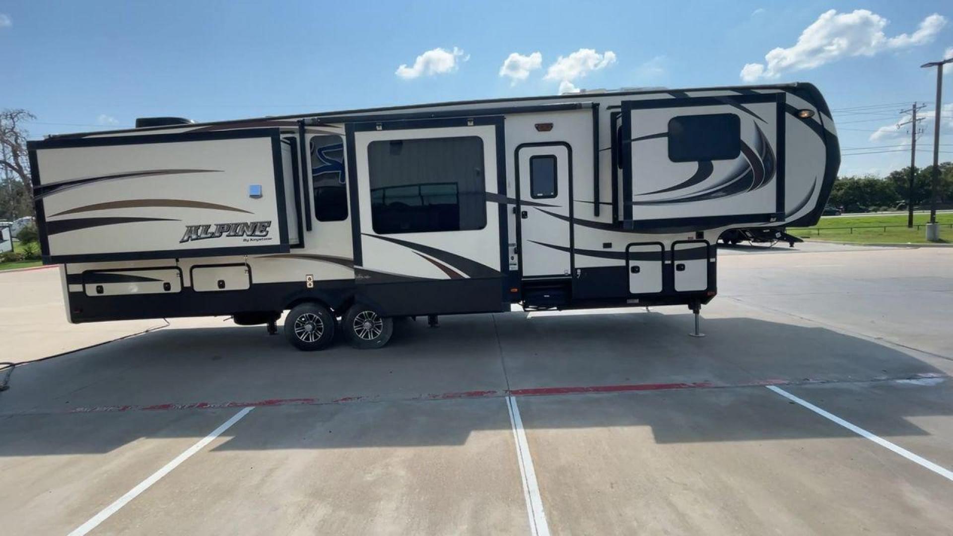 2014 GRAY KEYSTONE ALPINE 3620FL (4YDF36222EE) , Length: 39.08 ft. | Dry Weight: 12,370 lbs. | Gross Weight: 15,500 lbs. | Slides: 6 transmission, located at 4319 N Main Street, Cleburne, TX, 76033, (817) 221-0660, 32.435829, -97.384178 - Experience the 2014 Alpine 3620FL fifth wheel, the pinnacle of comfort and elegance. This RV, painstakingly designed and built by Alpine, provides the best possible fifth wheel travel experience for individuals who want nothing less. The dimensions of this unit are 39.08 ft in length, 8 ft in width, - Photo#2