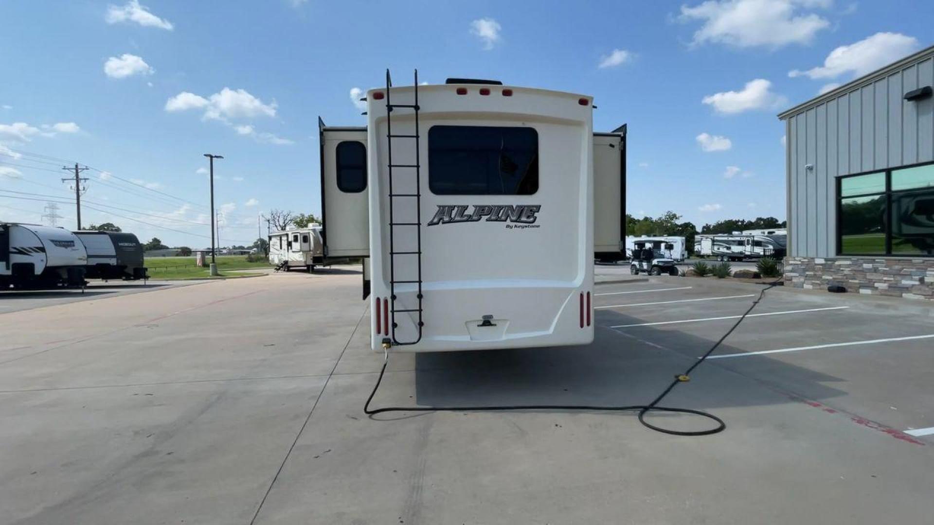 2014 GRAY KEYSTONE ALPINE 3620FL (4YDF36222EE) , Length: 39.08 ft. | Dry Weight: 12,370 lbs. | Gross Weight: 15,500 lbs. | Slides: 6 transmission, located at 4319 N Main Street, Cleburne, TX, 76033, (817) 221-0660, 32.435829, -97.384178 - Experience the 2014 Alpine 3620FL fifth wheel, the pinnacle of comfort and elegance. This RV, painstakingly designed and built by Alpine, provides the best possible fifth wheel travel experience for individuals who want nothing less. The dimensions of this unit are 39.08 ft in length, 8 ft in width, - Photo#8