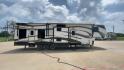 2014 WHITE KEYSTONE FUZION M-399 (4YDF39939EF) , Length: 41 ft. | Dry Weight: 14,100 lbs. | Gross Weight: 18,000 lbs. | Slides: 3 transmission, located at 4319 N Main Street, Cleburne, TX, 76033, (817) 221-0660, 32.435829, -97.384178 - The 2014 Keystone Fuzion M-399 offers exceptional value for its price. With its white exterior color, this RV stands out on the road and is sure to turn heads wherever you go. Measuring 41 ft. in length, this toy hauler provides ample space for you and your loved ones to relax and enjoy your travels - Photo#2