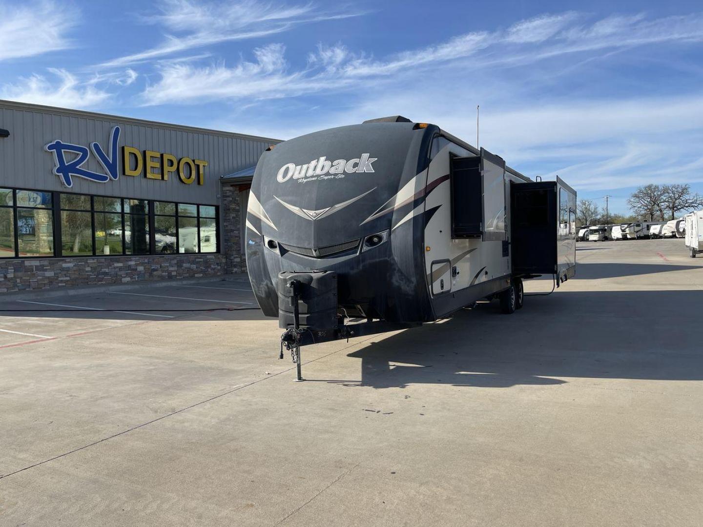 2014 KEYSTONE OUTBACK (4YDT29824EB) , located at 4319 N Main Street, Cleburne, TX, 76033, (817) 221-0660, 32.435829, -97.384178 - Photo#0