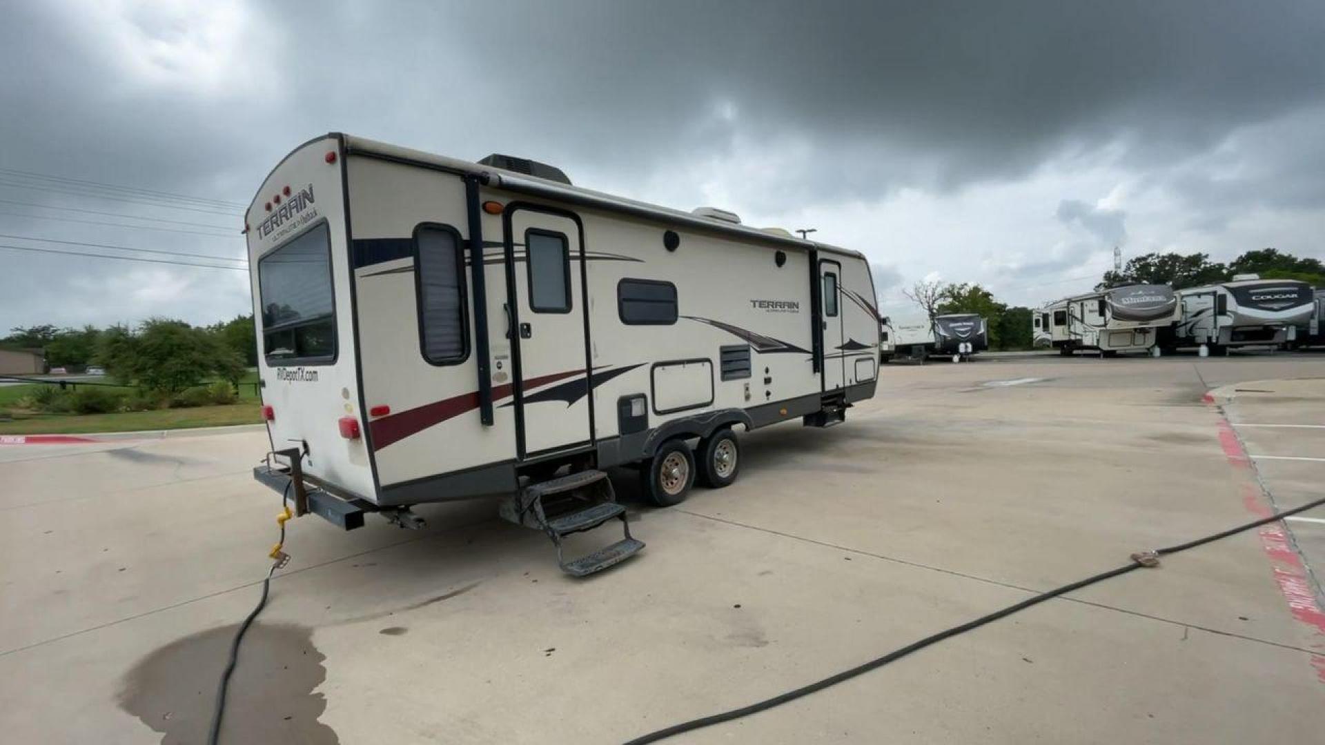 2014 TAN KEYSTONE OUTBACK TERRAIN 273T (4YDT27323EB) , Length: 30 ft. | Dry Weight: 5,758 lbs. | Gross Weight: 7,800 lbs. | Slides: 1 transmission, located at 4319 N Main Street, Cleburne, TX, 76033, (817) 221-0660, 32.435829, -97.384178 - With the 2014 Keystone Outback Terrain 273TRL travel trailer, set out on your next adventure. This well-thought-out RV offers the ideal balance of flair and utility, making it a home away from home for your journeys. The dimensions of this unit are 30 ft in length, 8 ft in width, and 10.92 ft in - Photo#1