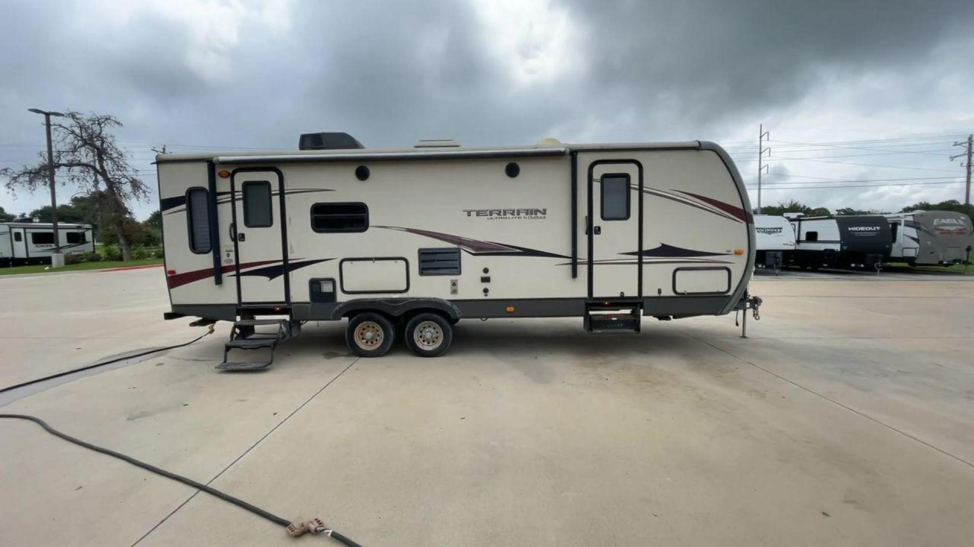 2014 TAN KEYSTONE OUTBACK TERRAIN 273T (4YDT27323EB) , Length: 30 ft. | Dry Weight: 5,758 lbs. | Gross Weight: 7,800 lbs. | Slides: 1 transmission, located at 4319 N Main Street, Cleburne, TX, 76033, (817) 221-0660, 32.435829, -97.384178 - With the 2014 Keystone Outback Terrain 273TRL travel trailer, set out on your next adventure. This well-thought-out RV offers the ideal balance of flair and utility, making it a home away from home for your journeys. The dimensions of this unit are 30 ft in length, 8 ft in width, and 10.92 ft in - Photo#2