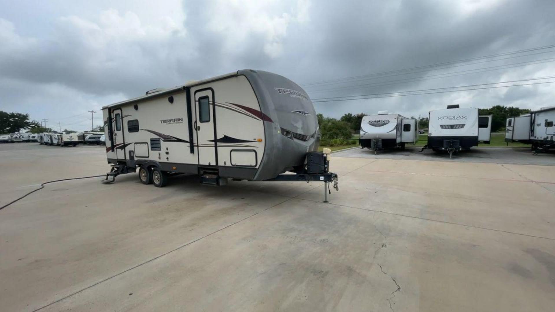 2014 TAN KEYSTONE OUTBACK TERRAIN 273T (4YDT27323EB) , Length: 30 ft. | Dry Weight: 5,758 lbs. | Gross Weight: 7,800 lbs. | Slides: 1 transmission, located at 4319 N Main Street, Cleburne, TX, 76033, (817) 221-0660, 32.435829, -97.384178 - With the 2014 Keystone Outback Terrain 273TRL travel trailer, set out on your next adventure. This well-thought-out RV offers the ideal balance of flair and utility, making it a home away from home for your journeys. The dimensions of this unit are 30 ft in length, 8 ft in width, and 10.92 ft in - Photo#3