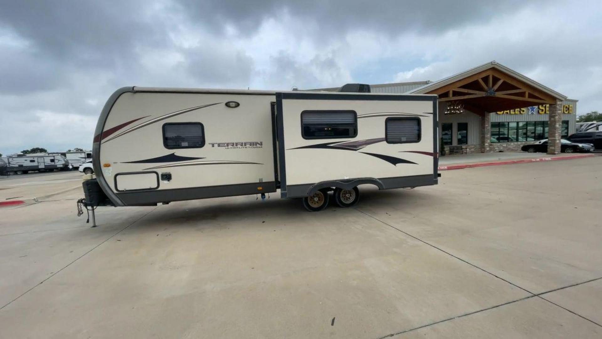 2014 TAN KEYSTONE OUTBACK TERRAIN 273T (4YDT27323EB) , Length: 30 ft. | Dry Weight: 5,758 lbs. | Gross Weight: 7,800 lbs. | Slides: 1 transmission, located at 4319 N Main Street, Cleburne, TX, 76033, (817) 221-0660, 32.435829, -97.384178 - With the 2014 Keystone Outback Terrain 273TRL travel trailer, set out on your next adventure. This well-thought-out RV offers the ideal balance of flair and utility, making it a home away from home for your journeys. The dimensions of this unit are 30 ft in length, 8 ft in width, and 10.92 ft in - Photo#6