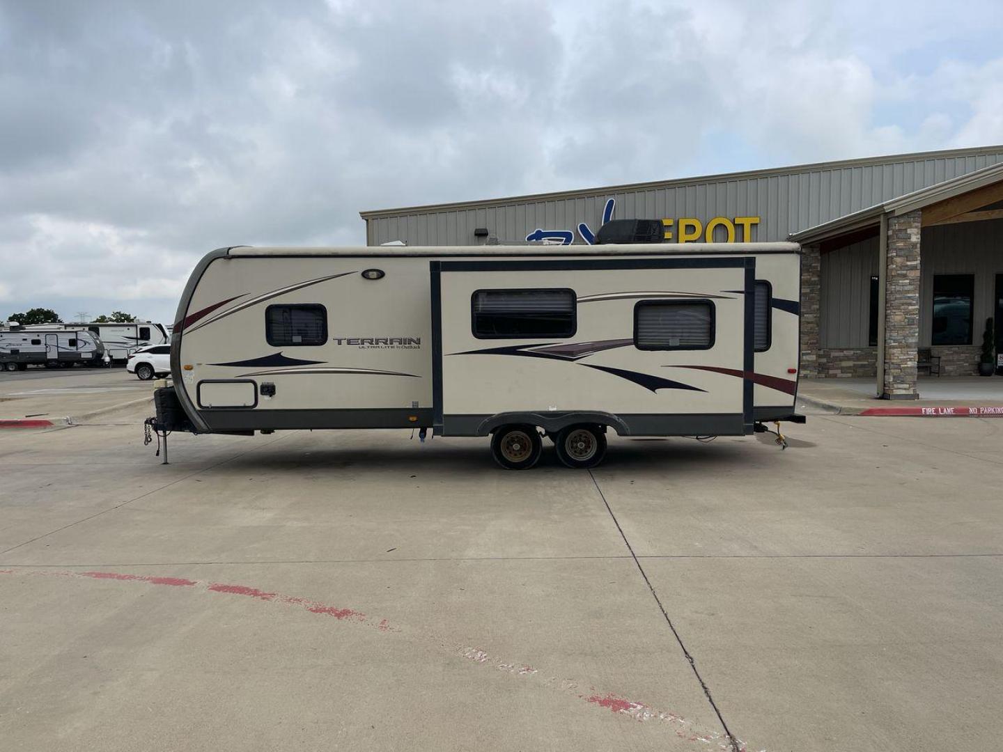 2014 TAN KEYSTONE OUTBACK TERRAIN 273T (4YDT27323EB) , Length: 30 ft. | Dry Weight: 5,758 lbs. | Gross Weight: 7,800 lbs. | Slides: 1 transmission, located at 4319 N Main Street, Cleburne, TX, 76033, (817) 221-0660, 32.435829, -97.384178 - With the 2014 Keystone Outback Terrain 273TRL travel trailer, set out on your next adventure. This well-thought-out RV offers the ideal balance of flair and utility, making it a home away from home for your journeys. The dimensions of this unit are 30 ft in length, 8 ft in width, and 10.92 ft in - Photo#24