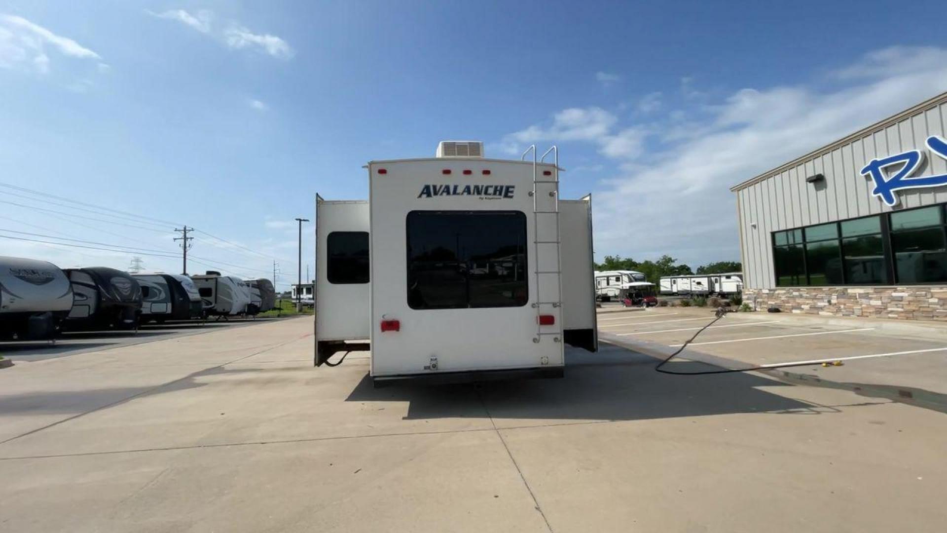 2014 KEYSTONE RV AVALANCHE 345TG (4YDF34521EE) , Length: 37.92 ft. | Dry Weight: 11,417 lbs. | Gross Weight: 14,140 lbs. | Slides: 3 transmission, located at 4319 N Main Street, Cleburne, TX, 76033, (817) 221-0660, 32.435829, -97.384178 - Set out on an adventure filled with luxury and comfort in the 2014 Keystone Avalanche 345TG, a fifth wheel crafted to elevate your RV experience. With its 37.92-foot size, this model seamlessly blends sophisticated design with functional features, making it an ideal sanctuary for your travels. Built - Photo#8