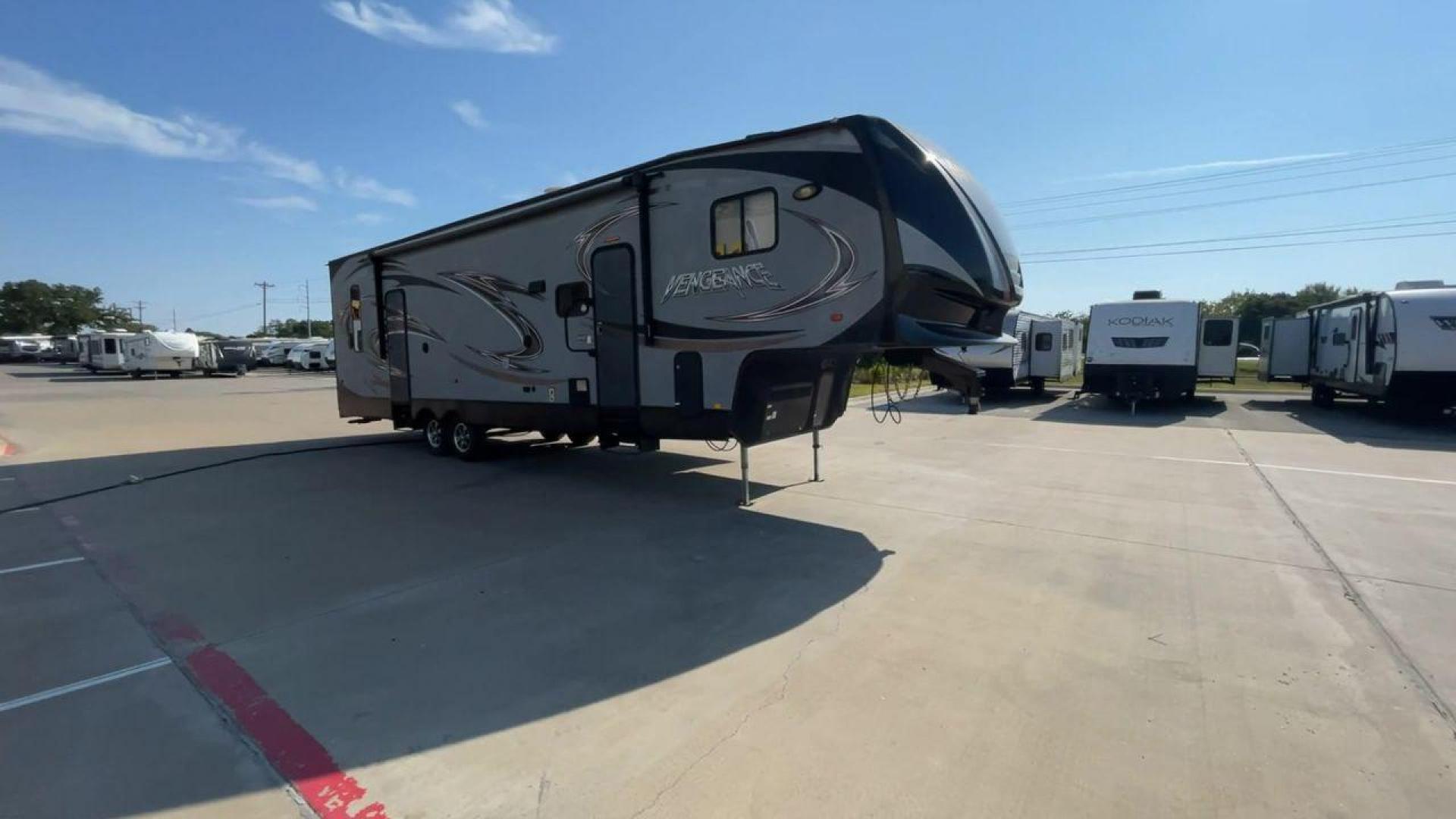 2014 KEYSTONE VENGEANCE 312A (4X4FVGG28EY) , Length: 37.92 ft. | Dry Weight: 10,068 lbs. | Gross Weight: 14,508 lbs. | Slides: 1 transmission, located at 4319 N Main Street, Cleburne, TX, 76033, (817) 221-0660, 32.435829, -97.384178 - This 2014 Keystone Vengeance 312A measures 37.92 ft. in length and has a dry weight of 10,068 lbs. It also has a GVWR of 14,508 lbs. and a hitch weight of 2,508 lbs. This unit has automatic heating and cooling for optimal temperature control. It is made of aluminum and fiberglass. This model also co - Photo#3