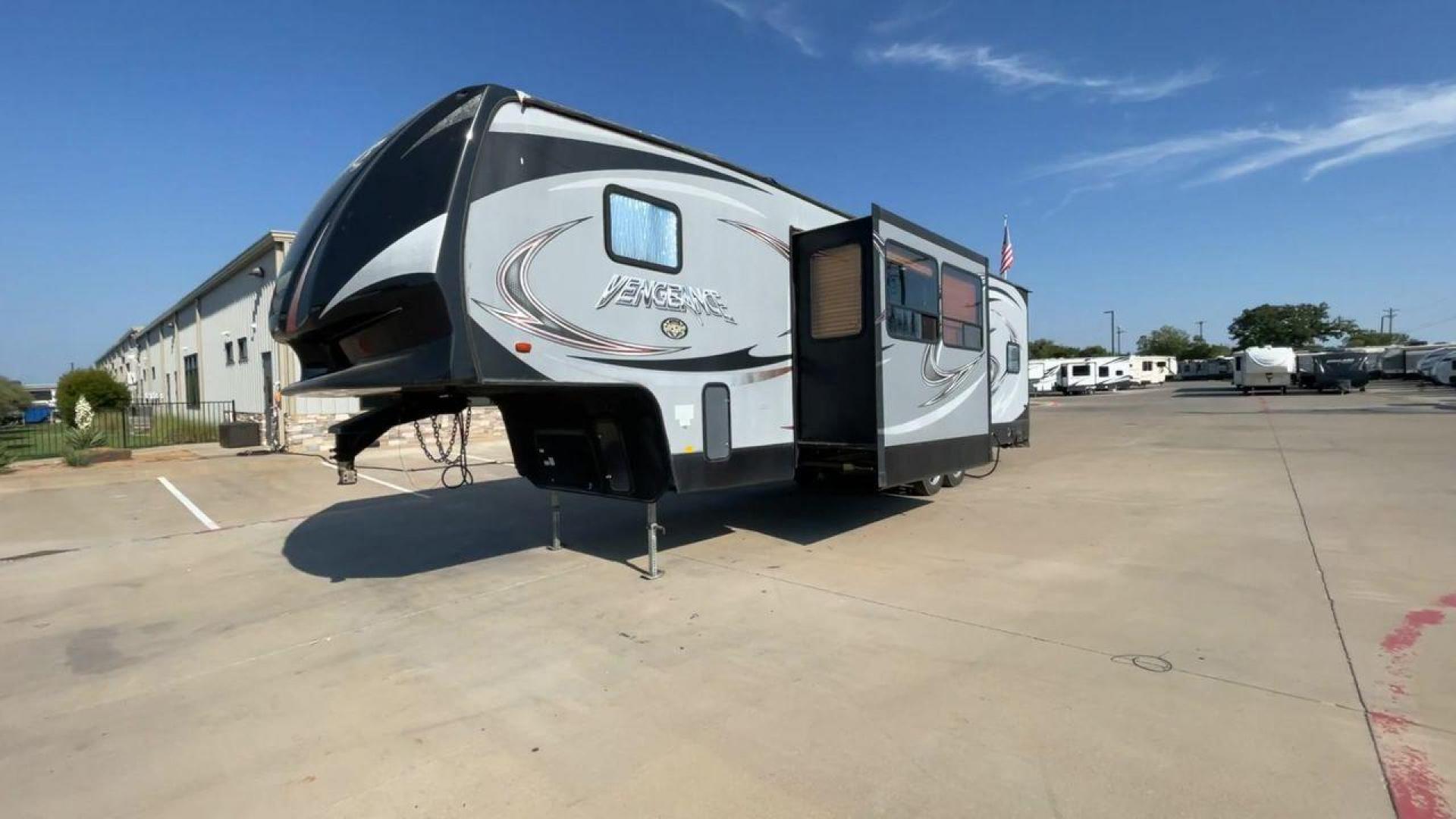 2014 KEYSTONE VENGEANCE 312A (4X4FVGG28EY) , Length: 37.92 ft. | Dry Weight: 10,068 lbs. | Gross Weight: 14,508 lbs. | Slides: 1 transmission, located at 4319 N Main Street, Cleburne, TX, 76033, (817) 221-0660, 32.435829, -97.384178 - This 2014 Keystone Vengeance 312A measures 37.92 ft. in length and has a dry weight of 10,068 lbs. It also has a GVWR of 14,508 lbs. and a hitch weight of 2,508 lbs. This unit has automatic heating and cooling for optimal temperature control. It is made of aluminum and fiberglass. This model also co - Photo#5