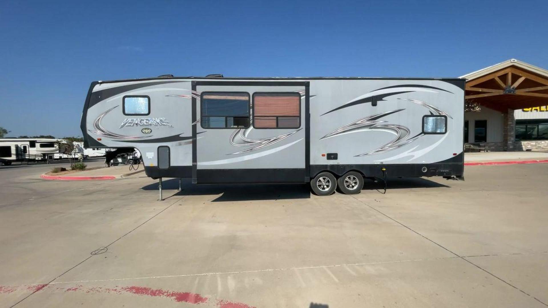 2014 KEYSTONE VENGEANCE 312A (4X4FVGG28EY) , Length: 37.92 ft. | Dry Weight: 10,068 lbs. | Gross Weight: 14,508 lbs. | Slides: 1 transmission, located at 4319 N Main Street, Cleburne, TX, 76033, (817) 221-0660, 32.435829, -97.384178 - This 2014 Keystone Vengeance 312A measures 37.92 ft. in length and has a dry weight of 10,068 lbs. It also has a GVWR of 14,508 lbs. and a hitch weight of 2,508 lbs. This unit has automatic heating and cooling for optimal temperature control. It is made of aluminum and fiberglass. This model also co - Photo#6