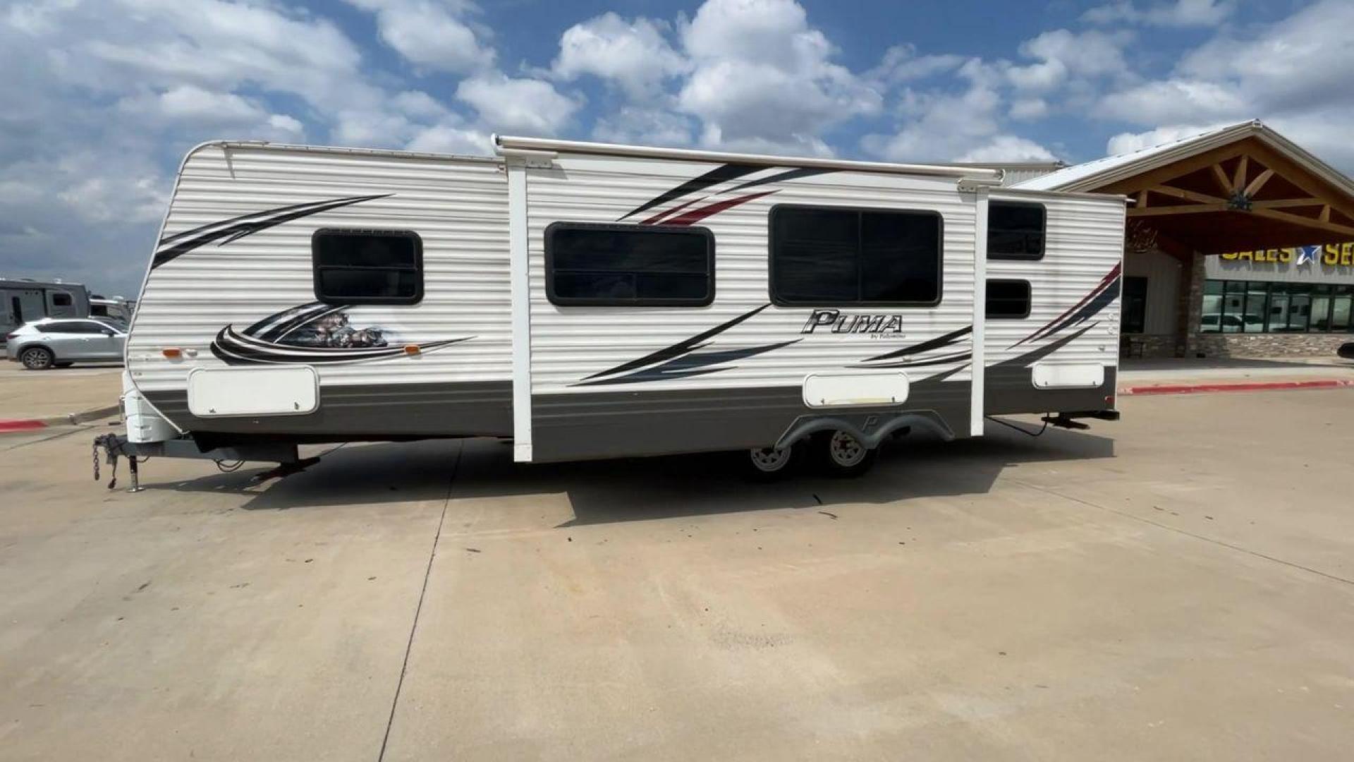 2014 PALOMINO PUMA PT30DBSS (4X4TPUF21EP) , Length: 33.5 ft. | Dry Weight: 6,675 lbs. | Gross Weight: 9,588 lbs. | Slides: 1 transmission, located at 4319 N Main Street, Cleburne, TX, 76033, (817) 221-0660, 32.435829, -97.384178 - Photo#6