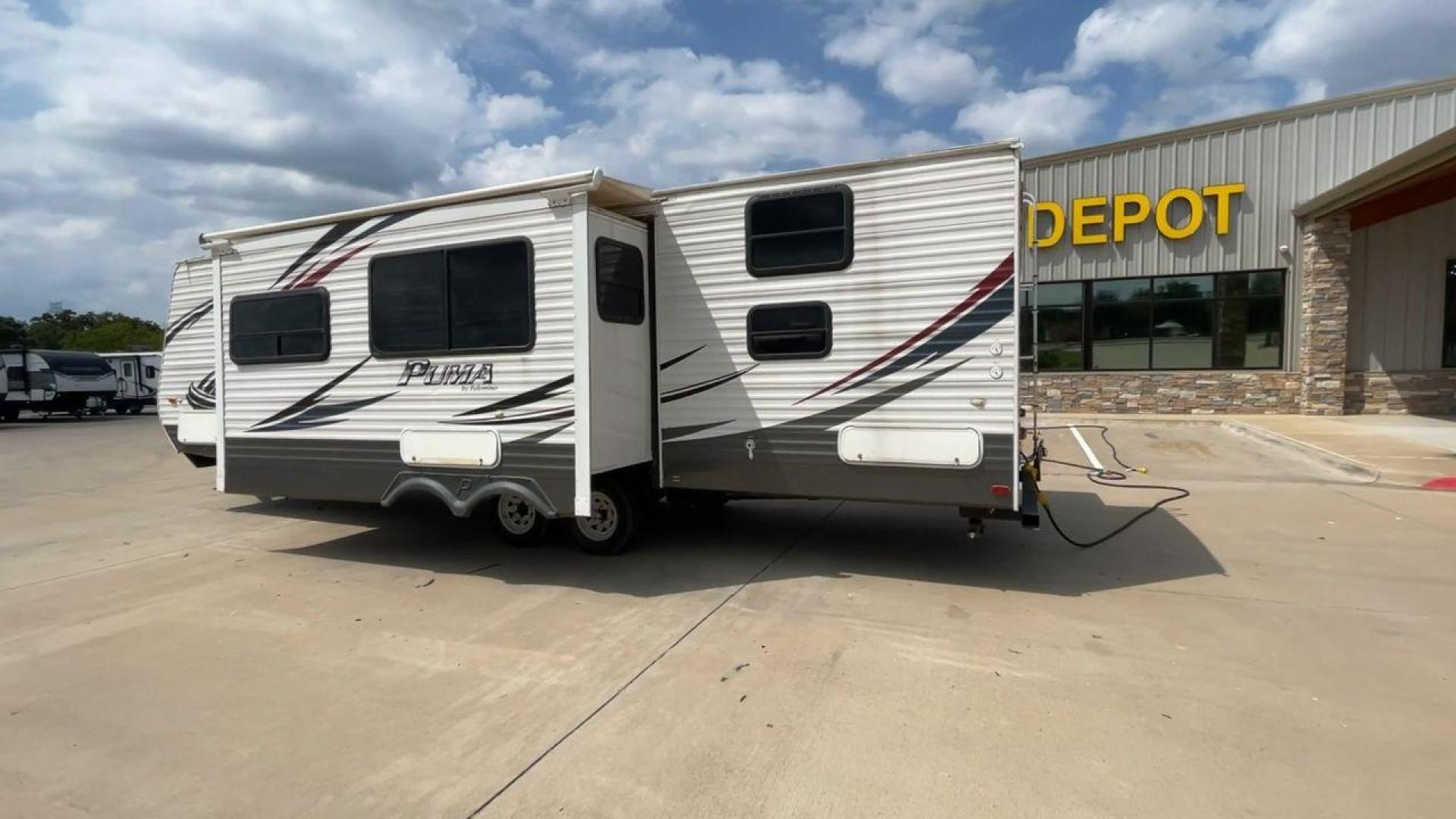 2014 PALOMINO PUMA PT30DBSS (4X4TPUF21EP) , Length: 33.5 ft. | Dry Weight: 6,675 lbs. | Gross Weight: 9,588 lbs. | Slides: 1 transmission, located at 4319 N Main Street, Cleburne, TX, 76033, (817) 221-0660, 32.435829, -97.384178 - Photo#7