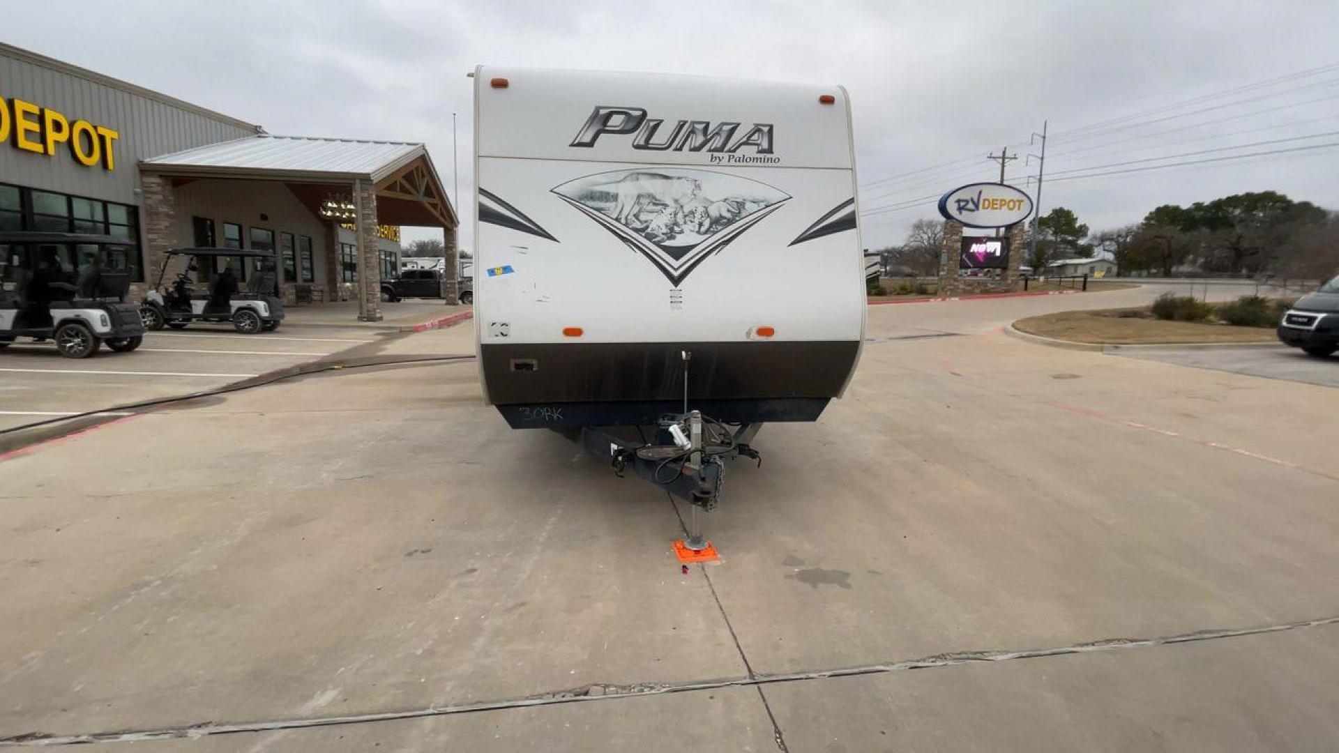 2014 WHITE PUMA 30RKSS (4X4TPUF23EP) , Length: 32.75 ft. | Dry Weight: 6,670 lbs. | Gross Weight: 9,827 lbs. | Slides: 1 transmission, located at 4319 N Main Street, Cleburne, TX, 76033, (817) 221-0660, 32.435829, -97.384178 - Looking for a travel trailer that offers comfort, convenience, and style? Look no further than this 2014 PUMA 30RKSS available at RV Depot in Cleburne, TX. With its spacious interior, sleek white exterior, and rear living layout, this travel trailer is perfect for your next adventure. The PUMA 30RK - Photo#4