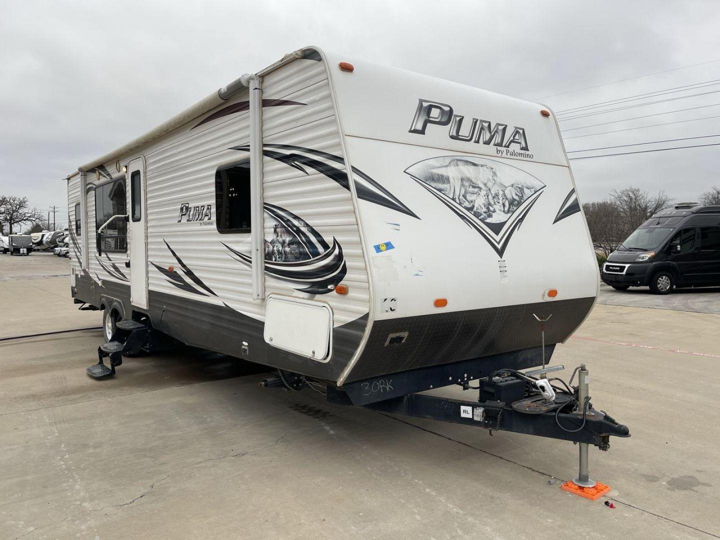 2014 WHITE PUMA 30RKSS (4X4TPUF23EP) , Length: 32.75 ft. | Dry Weight: 6,670 lbs. | Gross Weight: 9,827 lbs. | Slides: 1 transmission, located at 4319 N Main Street, Cleburne, TX, 76033, (817) 221-0660, 32.435829, -97.384178 - Looking for a travel trailer that offers comfort, convenience, and style? Look no further than this 2014 PUMA 30RKSS available at RV Depot in Cleburne, TX. With its spacious interior, sleek white exterior, and rear living layout, this travel trailer is perfect for your next adventure. The PUMA 30RK - Photo#22