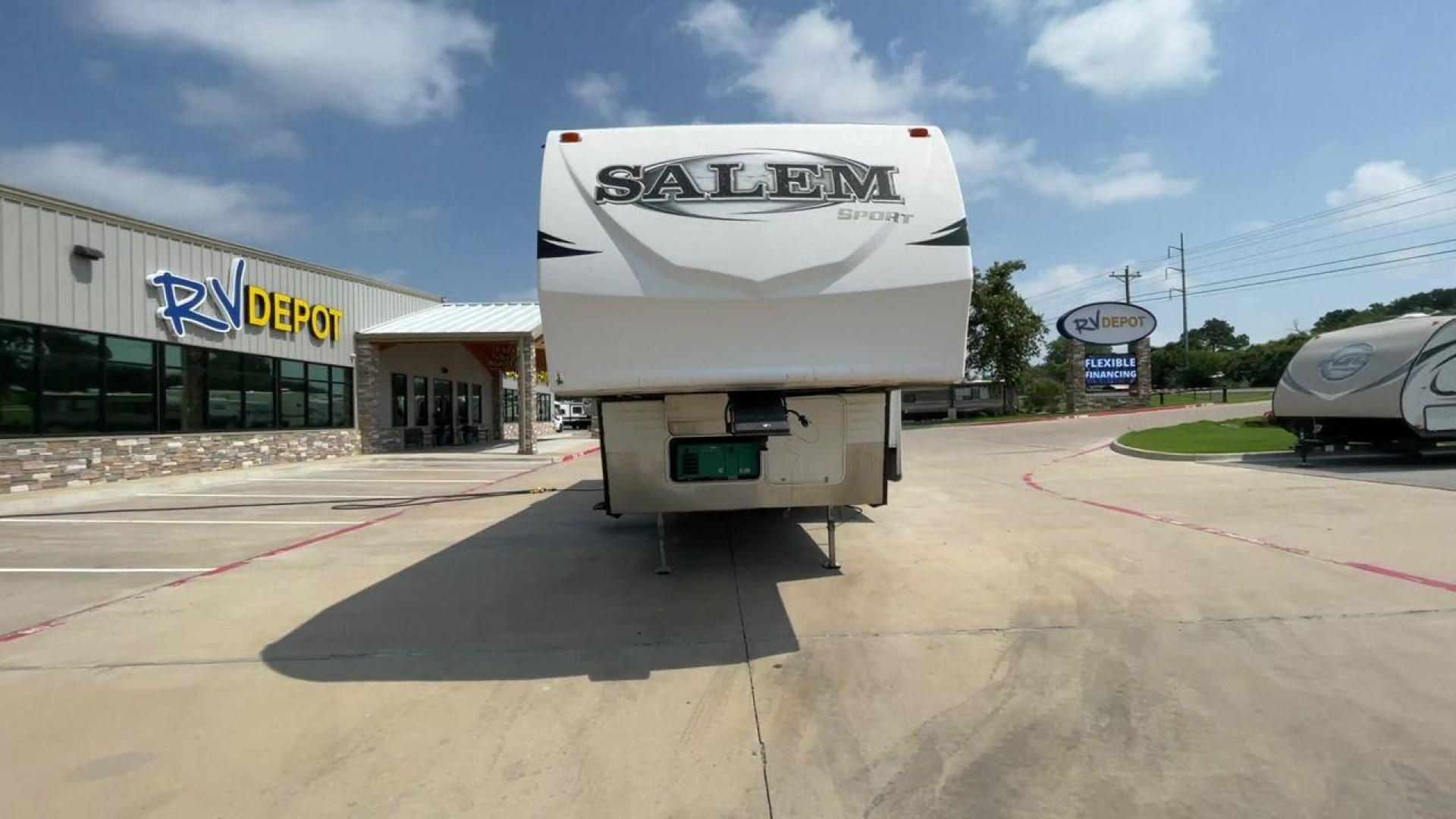 2014 GRAY SALEM 32SRVP - (4X4FSTH29ER) , Length: 34.5 ft. | Dry Weight: 8,198 lbs. | Slides: 1 transmission, located at 4319 N Main Street, Cleburne, TX, 76033, (817) 221-0660, 32.435829, -97.384178 - Take advantage of the 2014 Salem 32SRVP Toy Hauler and unleash your sense of adventure. With living space and a designated room for your favorite toys, this tough and adaptable RV is made to fit your outdoor lifestyle. The dimensions of this unit are 34.5 ft in length by 10.08 ft in height. It ha - Photo#4