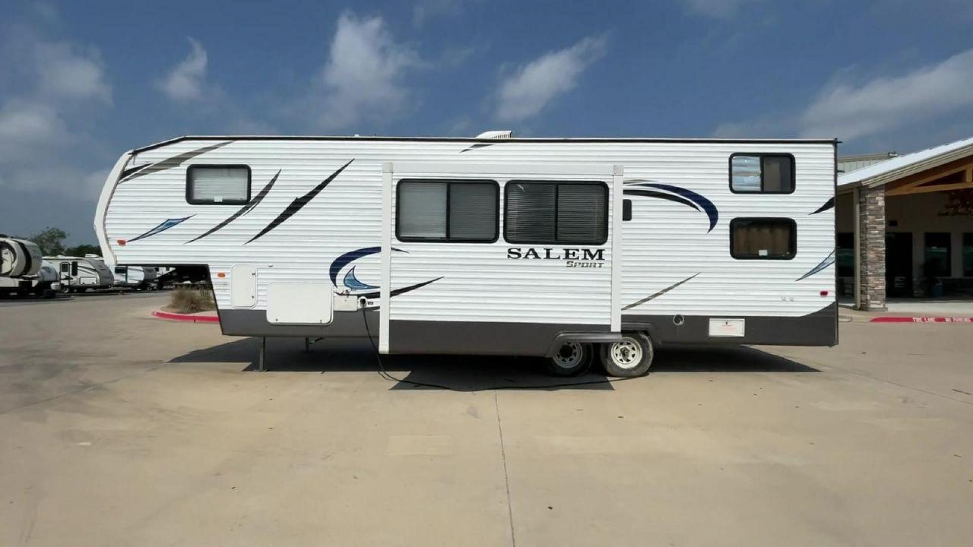 2014 GRAY SALEM 32SRVP - (4X4FSTH29ER) , Length: 34.5 ft. | Dry Weight: 8,198 lbs. | Slides: 1 transmission, located at 4319 N Main Street, Cleburne, TX, 76033, (817) 221-0660, 32.435829, -97.384178 - Take advantage of the 2014 Salem 32SRVP Toy Hauler and unleash your sense of adventure. With living space and a designated room for your favorite toys, this tough and adaptable RV is made to fit your outdoor lifestyle. The dimensions of this unit are 34.5 ft in length by 10.08 ft in height. It ha - Photo#6