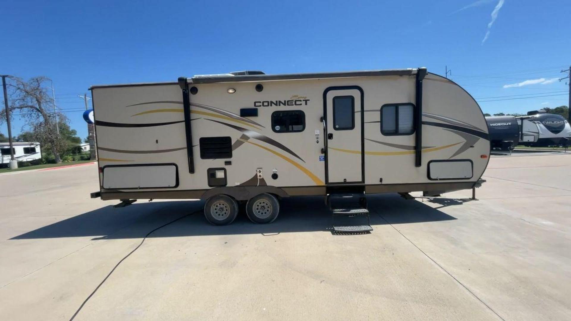 2014 TAN SPREE CONNECT 250BHS (4EZTL2524E8) , Slides: 1 transmission, located at 4319 N Main Street, Cleburne, TX, 76033, (817) 221-0660, 32.435829, -97.384178 - The 2014 Spree Connect 250BHS travel trailer lets you go on trips you'll never forget. It's the best place to stay away from home because it has a single slide-out and a roomy inside. When you step inside the Spree Connect 250BHS, you'll find a warm and welcoming space. There are a set of bunk beds - Photo#2