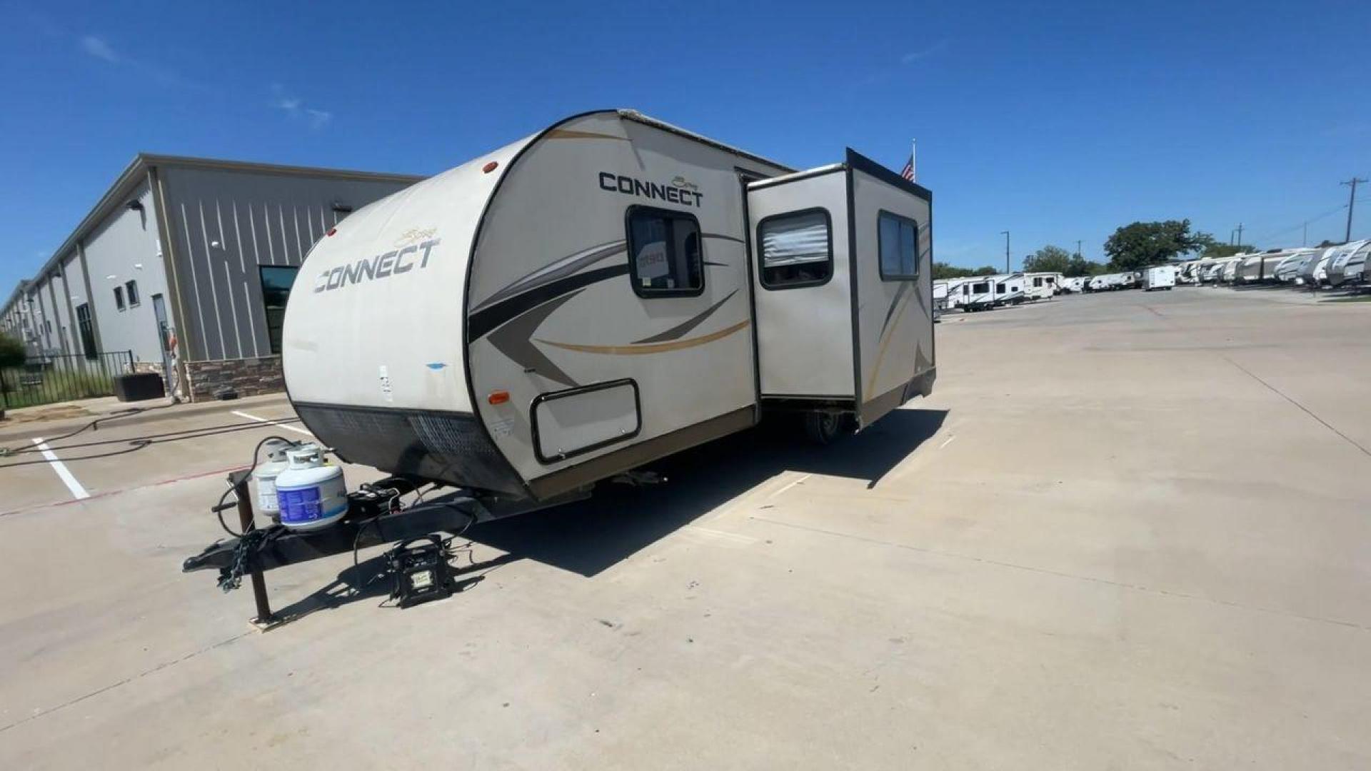 2014 TAN SPREE CONNECT 250BHS (4EZTL2524E8) , Slides: 1 transmission, located at 4319 N Main Street, Cleburne, TX, 76033, (817) 221-0660, 32.435829, -97.384178 - The 2014 Spree Connect 250BHS travel trailer lets you go on trips you'll never forget. It's the best place to stay away from home because it has a single slide-out and a roomy inside. When you step inside the Spree Connect 250BHS, you'll find a warm and welcoming space. There are a set of bunk beds - Photo#5