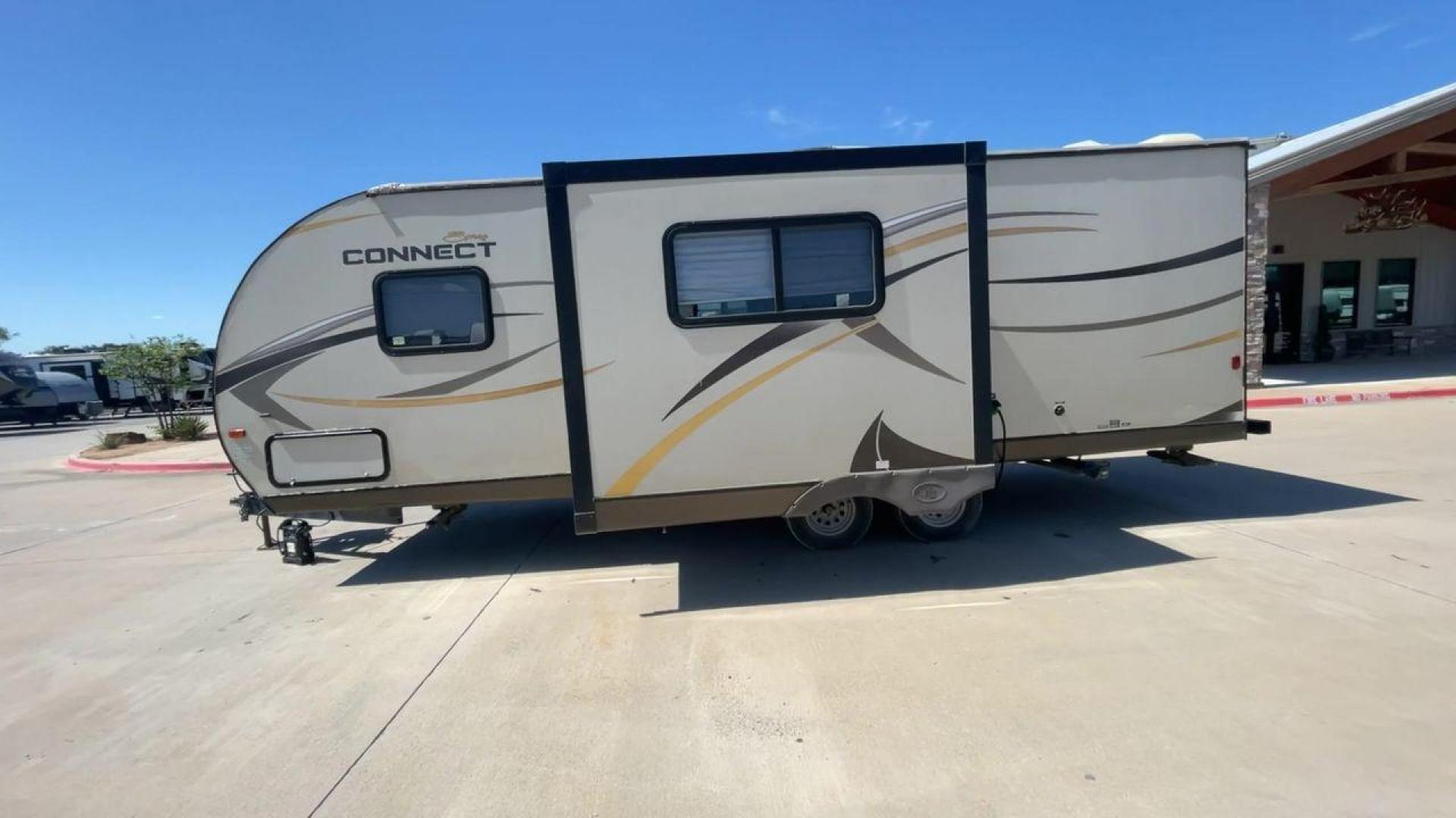 2014 TAN SPREE CONNECT 250BHS (4EZTL2524E8) , Slides: 1 transmission, located at 4319 N Main Street, Cleburne, TX, 76033, (817) 221-0660, 32.435829, -97.384178 - The 2014 Spree Connect 250BHS travel trailer lets you go on trips you'll never forget. It's the best place to stay away from home because it has a single slide-out and a roomy inside. When you step inside the Spree Connect 250BHS, you'll find a warm and welcoming space. There are a set of bunk beds - Photo#6