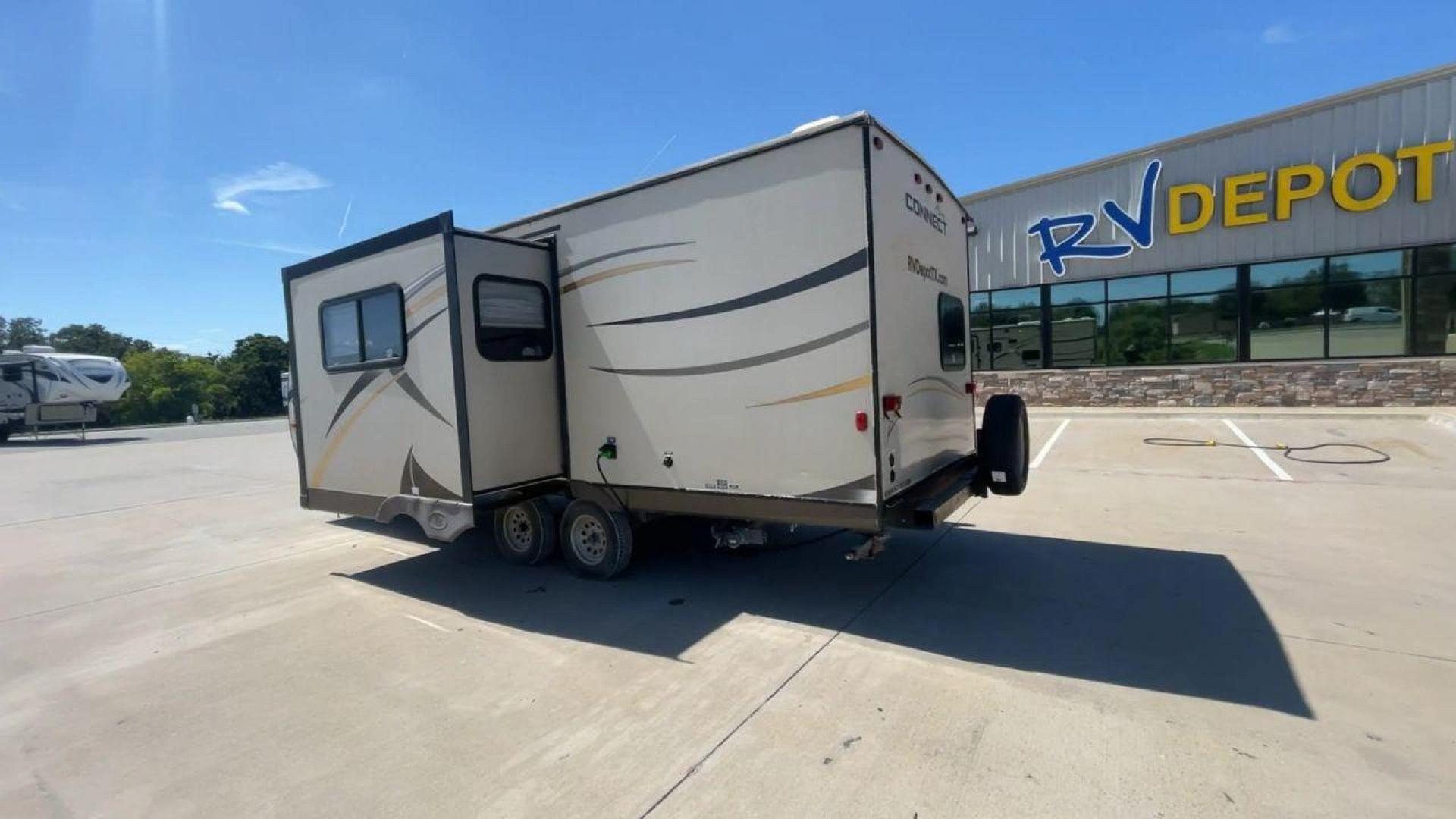 2014 TAN SPREE CONNECT 250BHS (4EZTL2524E8) , Slides: 1 transmission, located at 4319 N Main Street, Cleburne, TX, 76033, (817) 221-0660, 32.435829, -97.384178 - The 2014 Spree Connect 250BHS travel trailer lets you go on trips you'll never forget. It's the best place to stay away from home because it has a single slide-out and a roomy inside. When you step inside the Spree Connect 250BHS, you'll find a warm and welcoming space. There are a set of bunk beds - Photo#7