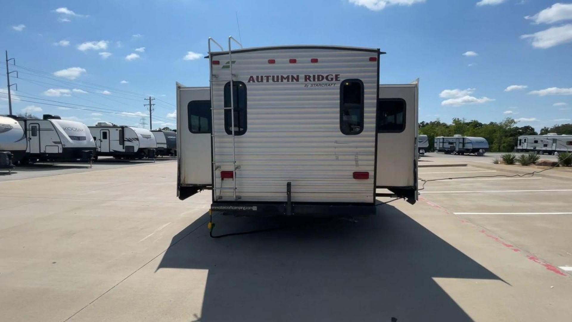 2014 WHITE STARCRAFT AUTUMN RIDGE346 RESA (1SABS0BU0E2) , Length: 38.25 ft. | Dry Weight: 8,385 lbs. | Gross Weight: 10,750 lbs. | Slides: 3 transmission, located at 4319 N Main Street, Cleburne, TX, 76033, (817) 221-0660, 32.435829, -97.384178 - With the 2014 Starcraft Autumn Ridge 346RESA travel trailer, you can unleash your inner explorer. For your outdoor adventures, this finely built and feature-rich RV is intended to bring you a cozy and delightful home away from home. This trailer has dimensions of 38.25 ft in length, 8 ft in width, a - Photo#8