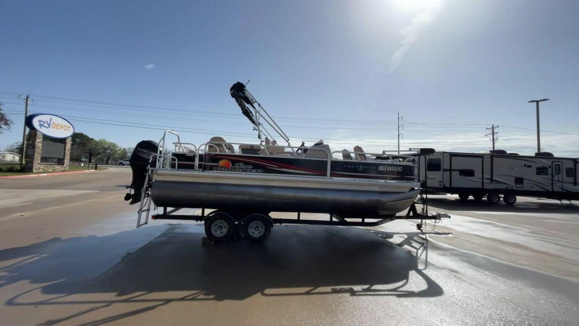 2014 BLACK SUNTRACKER FISHING BARGE 22DLX (BUJ22913D41) , located at 4319 N Main Street, Cleburne, TX, 76033, (817) 221-0660, 32.435829, -97.384178 - The 2014 Sun Tracker Fishin' Barge is here to make you happy. This adjustable pontoon boat is great for fishermen and people who love the outdoors. This Fishin' Barge is 21 feet long, so it has plenty of room for all your fishing tools and friends. The boat is built to last, and the Mercury outboar - Photo#2