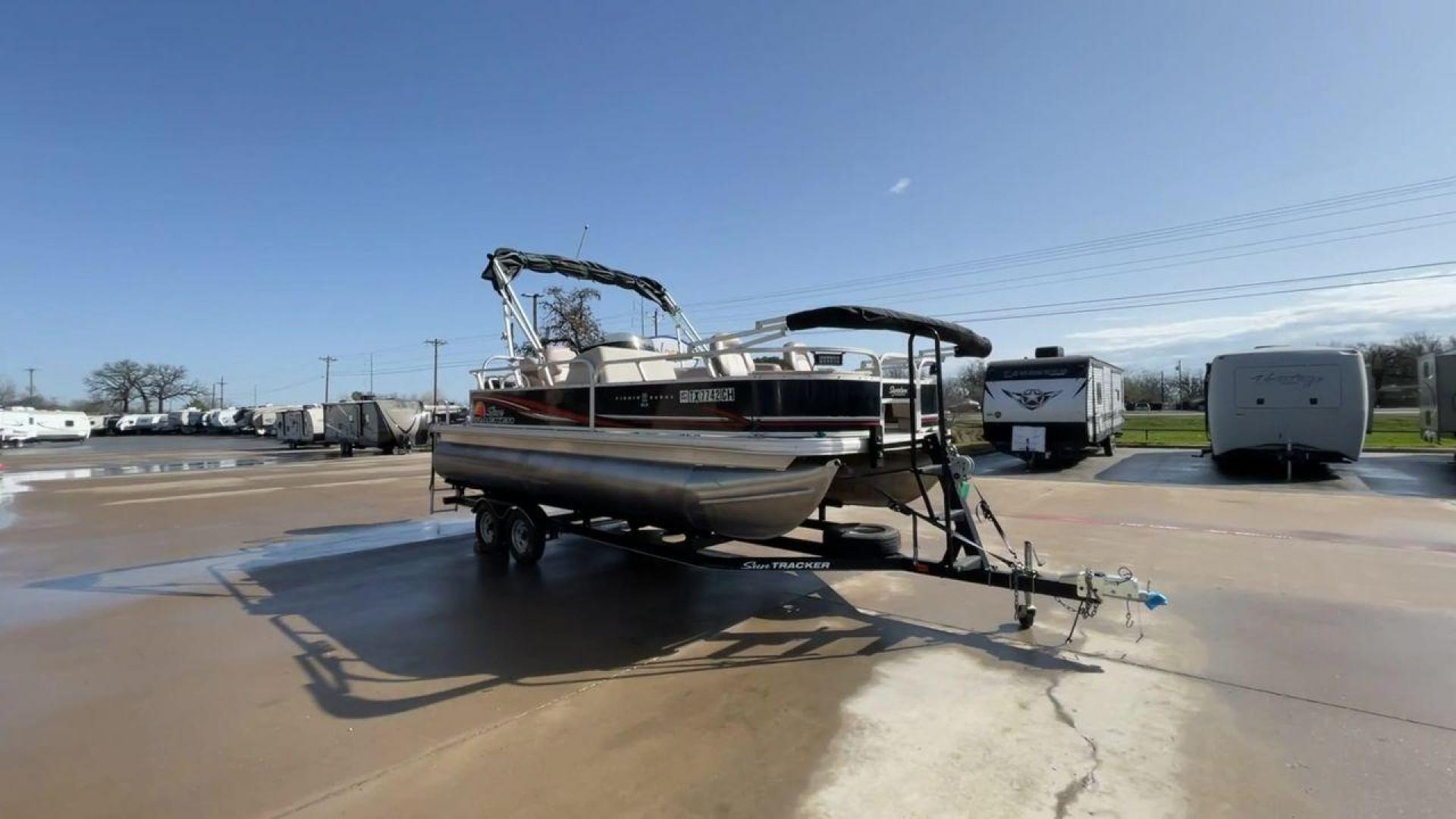 2014 BLACK SUNTRACKER FISHING BARGE 22DLX (BUJ22913D41) , located at 4319 N Main Street, Cleburne, TX, 76033, (817) 221-0660, 32.435829, -97.384178 - The 2014 Sun Tracker Fishin' Barge is here to make you happy. This adjustable pontoon boat is great for fishermen and people who love the outdoors. This Fishin' Barge is 21 feet long, so it has plenty of room for all your fishing tools and friends. The boat is built to last, and the Mercury outboar - Photo#3