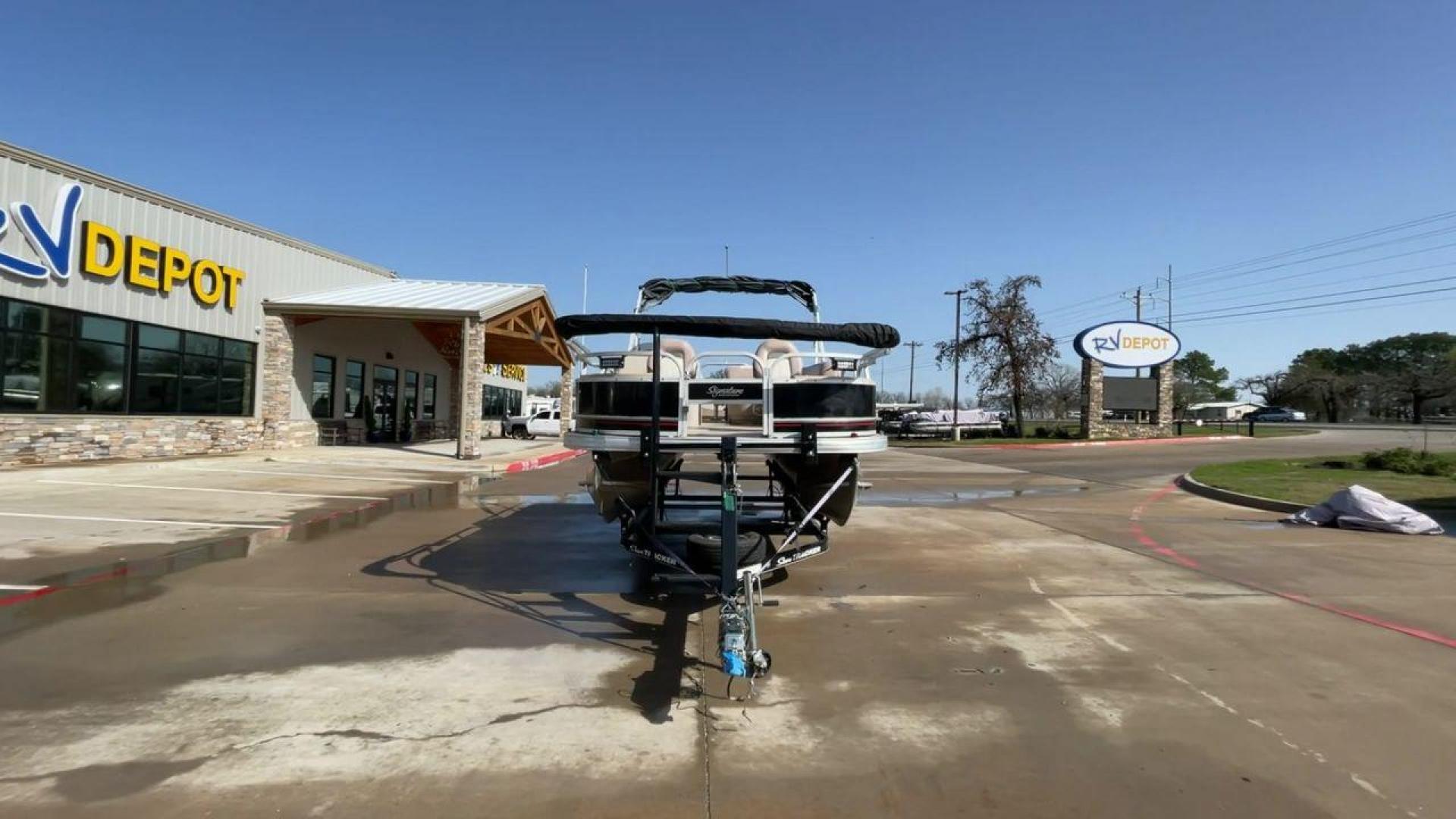 2014 BLACK SUNTRACKER FISHING BARGE 22DLX (BUJ22913D41) , located at 4319 N Main Street, Cleburne, TX, 76033, (817) 221-0660, 32.435829, -97.384178 - The 2014 Sun Tracker Fishin' Barge is here to make you happy. This adjustable pontoon boat is great for fishermen and people who love the outdoors. This Fishin' Barge is 21 feet long, so it has plenty of room for all your fishing tools and friends. The boat is built to last, and the Mercury outboar - Photo#4