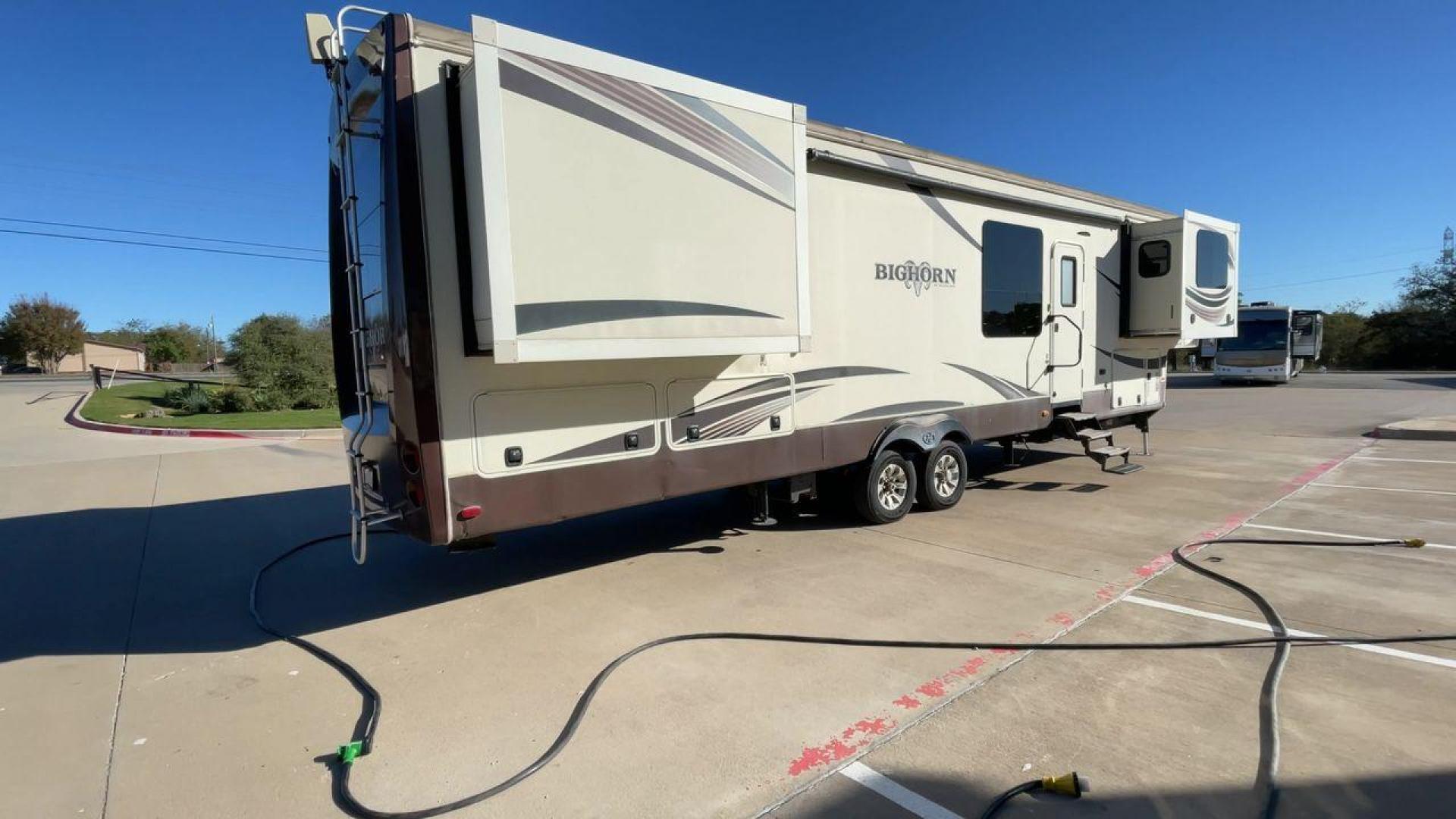 2015 TAN BIGHORN 3750FL (5SFBG4323FE) , Length: 41.7 ft. | Gross Weight: 16,000 lbs. | Slides: 5 transmission, located at 4319 N Main Street, Cleburne, TX, 76033, (817) 221-0660, 32.435829, -97.384178 - Photo#1