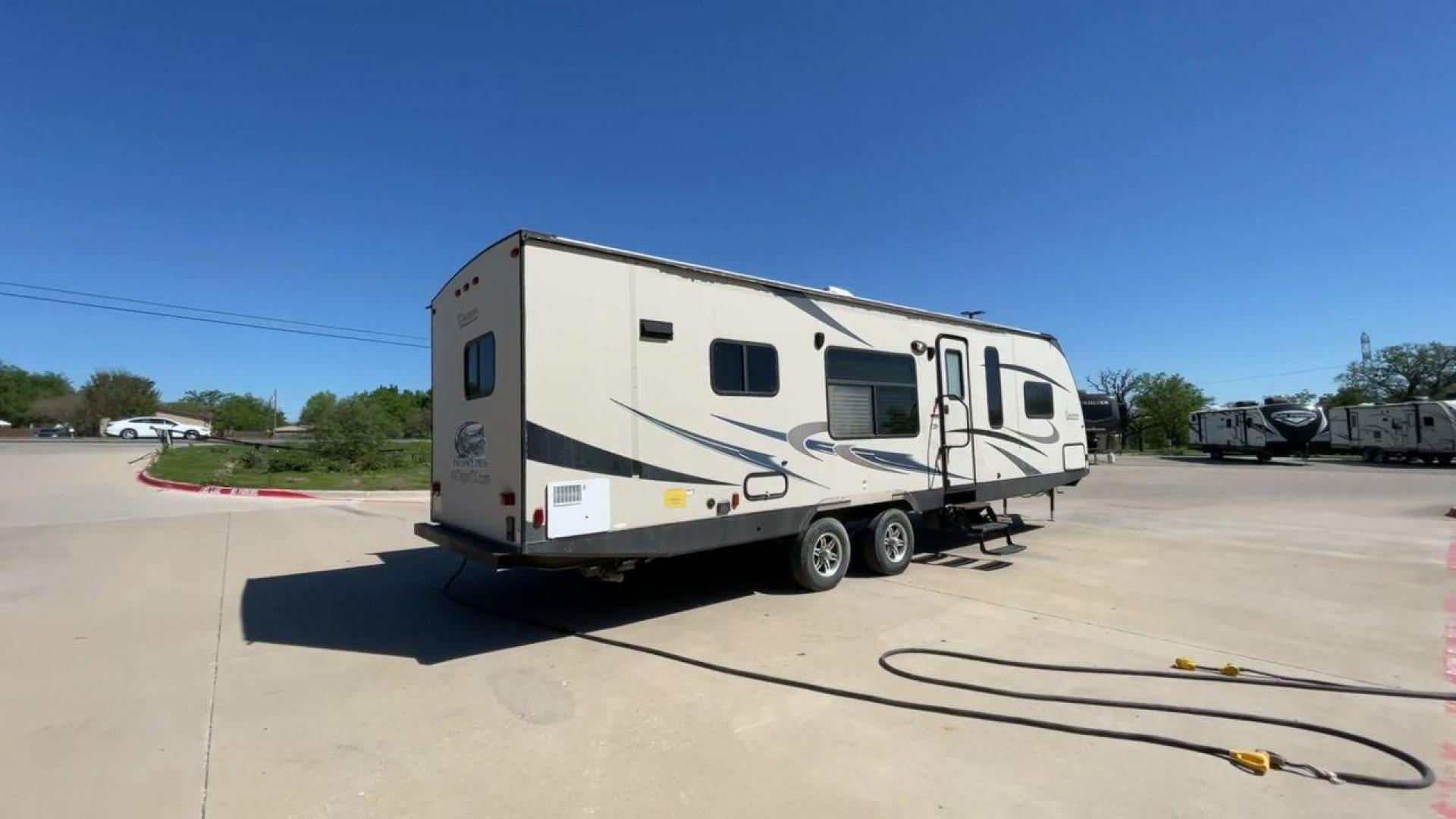 2015 WHITE COACHMEN FREEDOM EXPRESS 305R (5ZT2FEWB3FA) , Length: 34.5 ft | Dry Weight: 6,199 lbs | Gross Weight: 9,500 lbs | Slides: 2 transmission, located at 4319 N Main Street, Cleburne, TX, 76033, (817) 221-0660, 32.435829, -97.384178 - The 2015 Coachmen Freedom Express 305RKDS provides a large and comfortable traveling experience, ideal for people seeking adventure on the road. This travel trailer offers a generous amount of living space while still being easy to maneuver. It measures 34.5 feet in length and has a dry weight of 6, - Photo#1